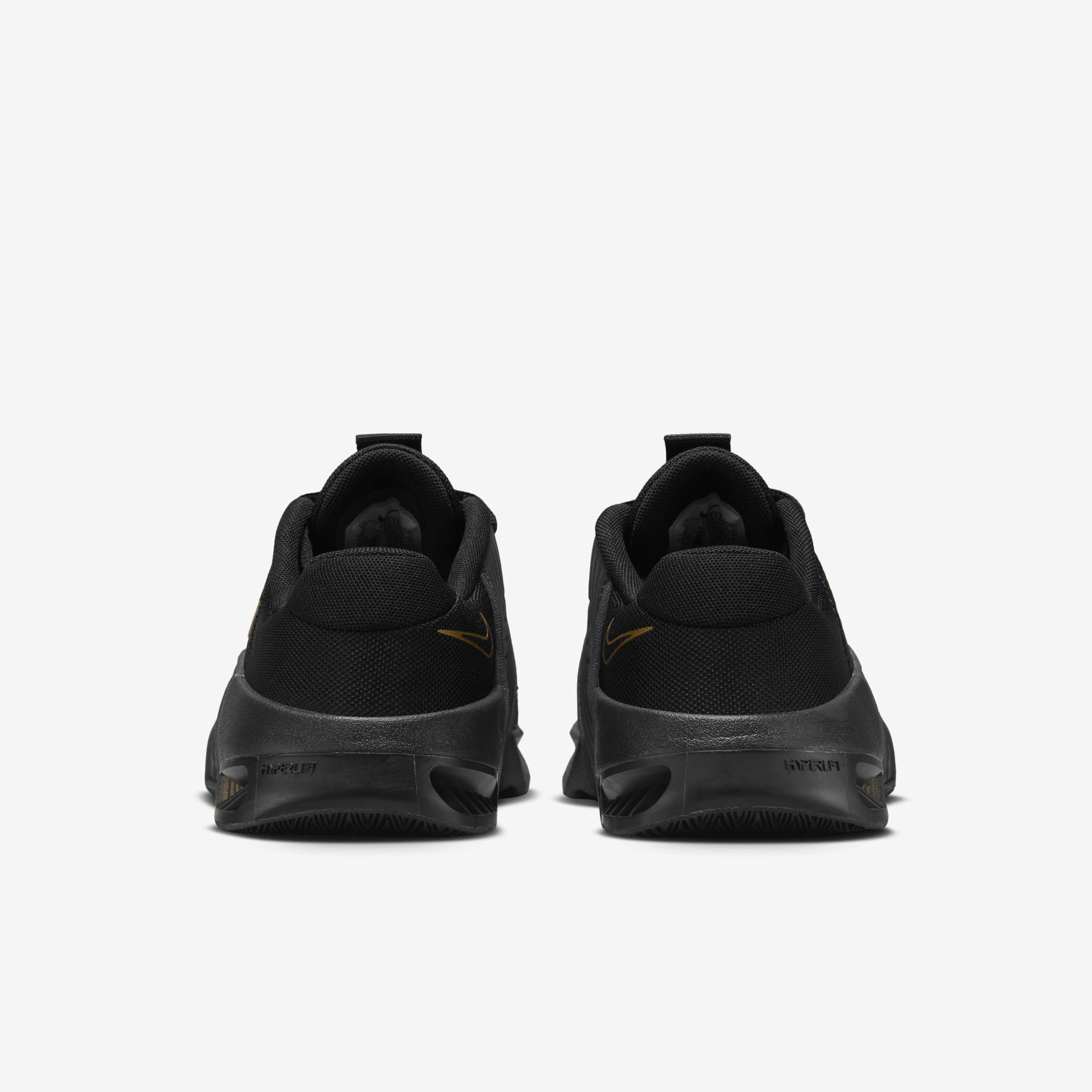 Women's nike metcon black and gold discount
