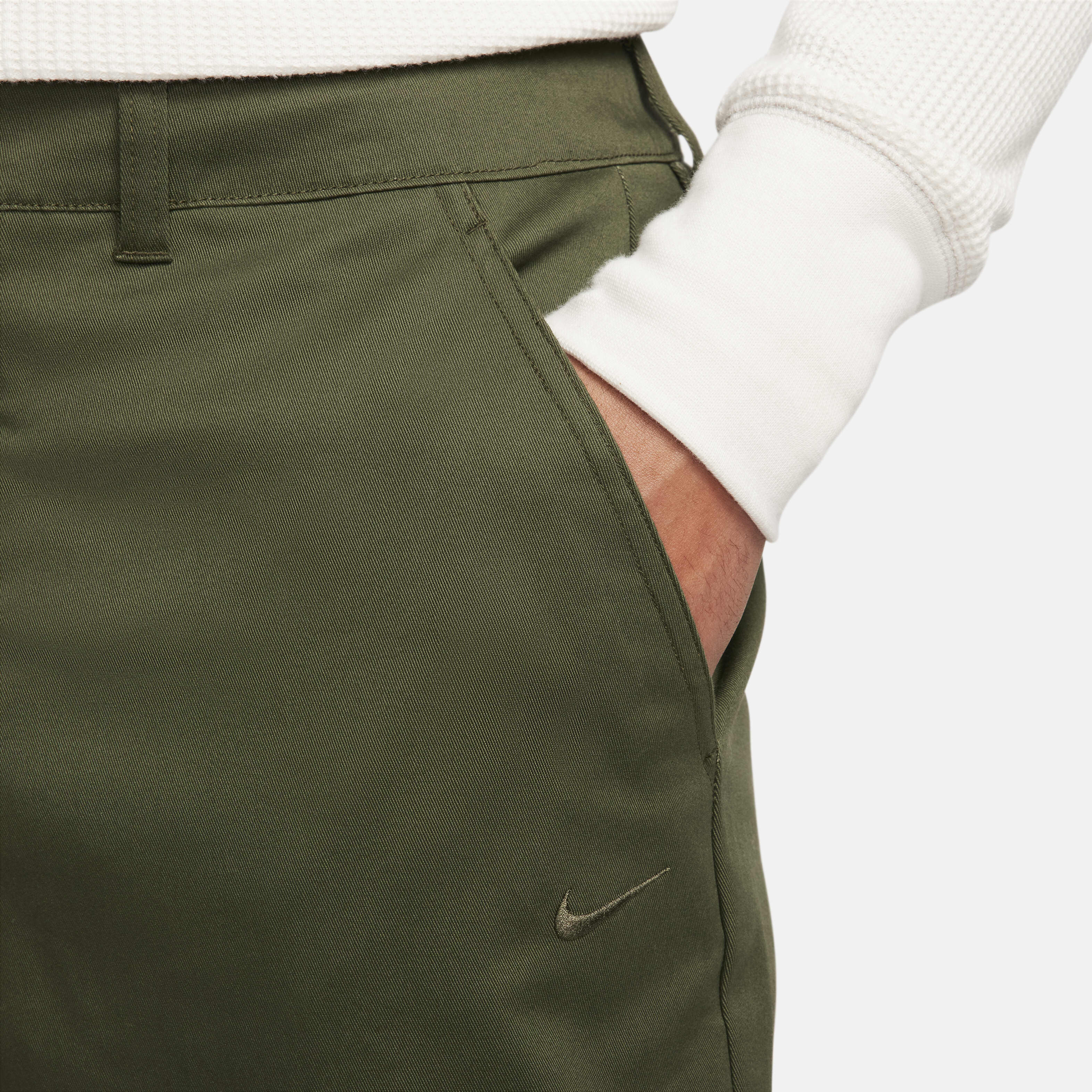 Nike woven chino trousers sales