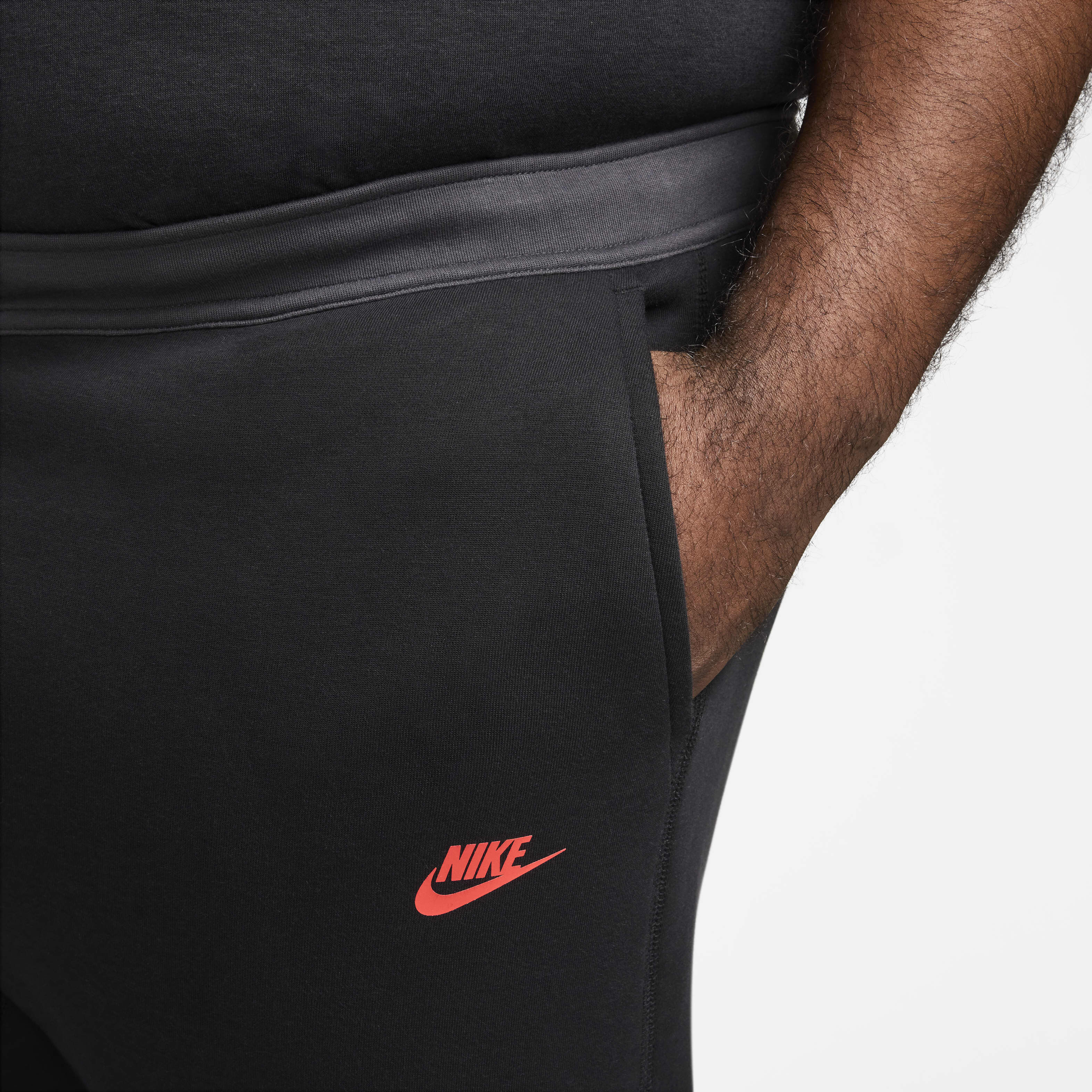 nike black joggers with red tick