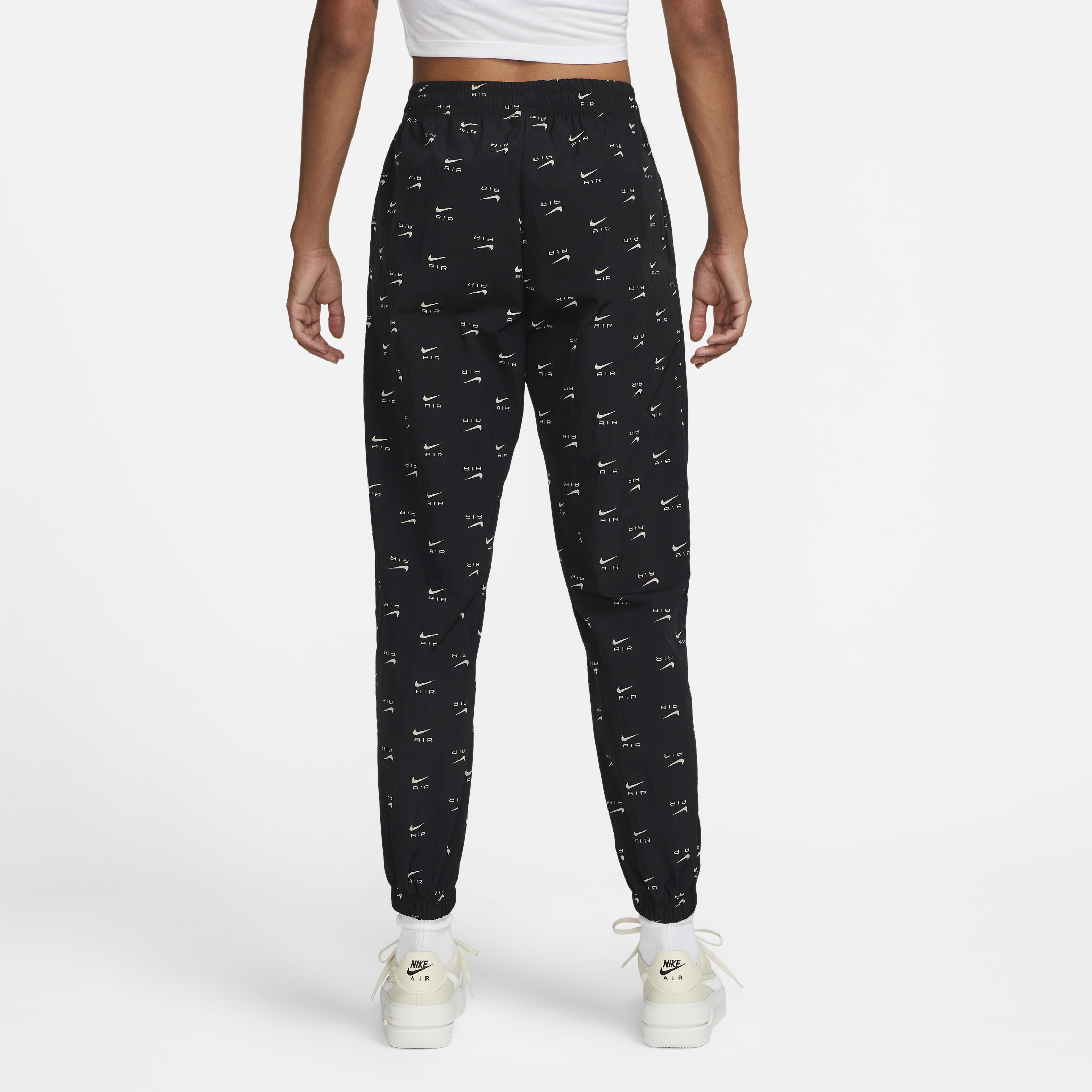 Buy Nike Air Women s Mid Rise Woven Printed Trousers Black Nike Kuwait Official