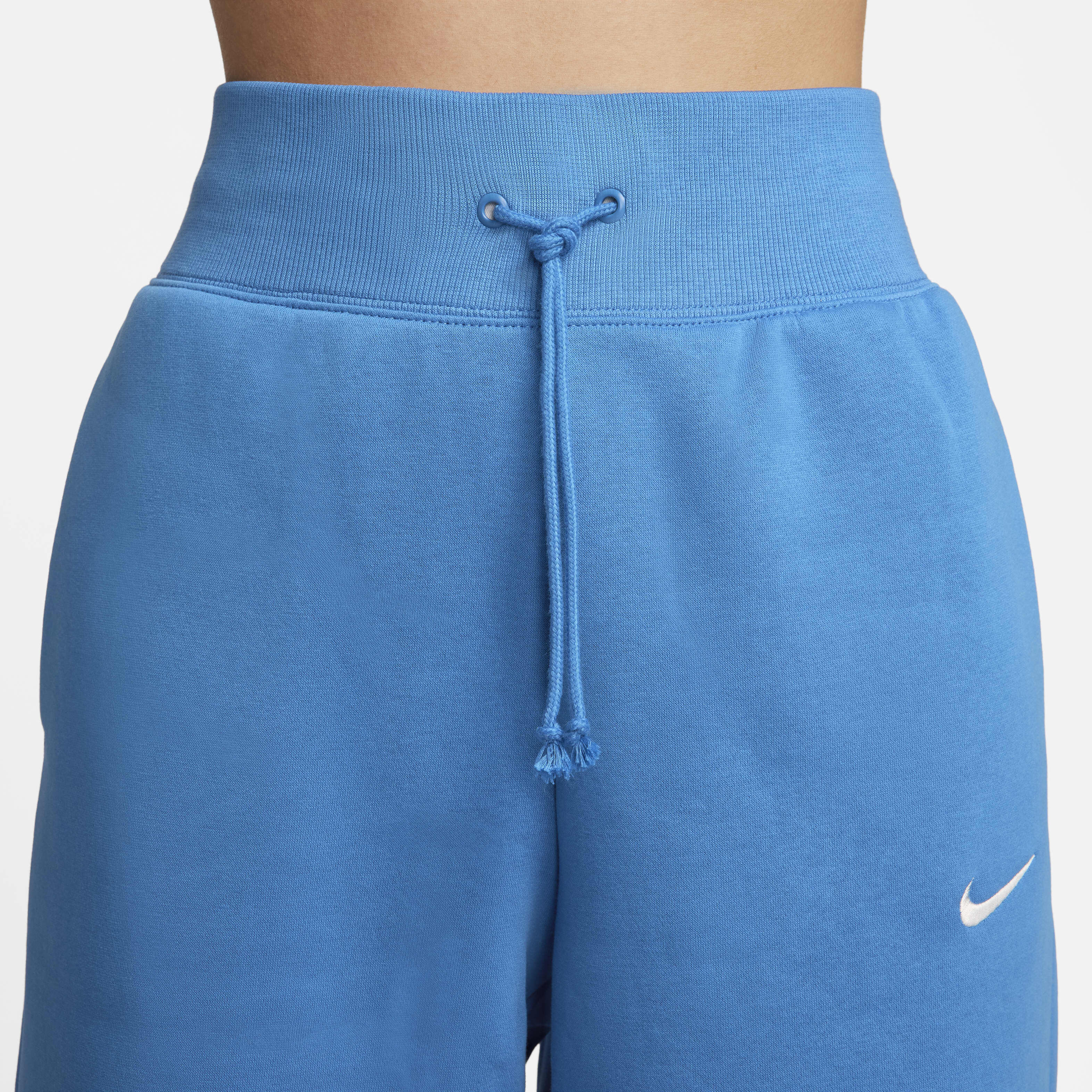 Buy Nike Sportswear Phoenix Fleece Women s High Waisted Cropped Tracksuit Bottoms Star Blue Sail Nike Kuwait Official