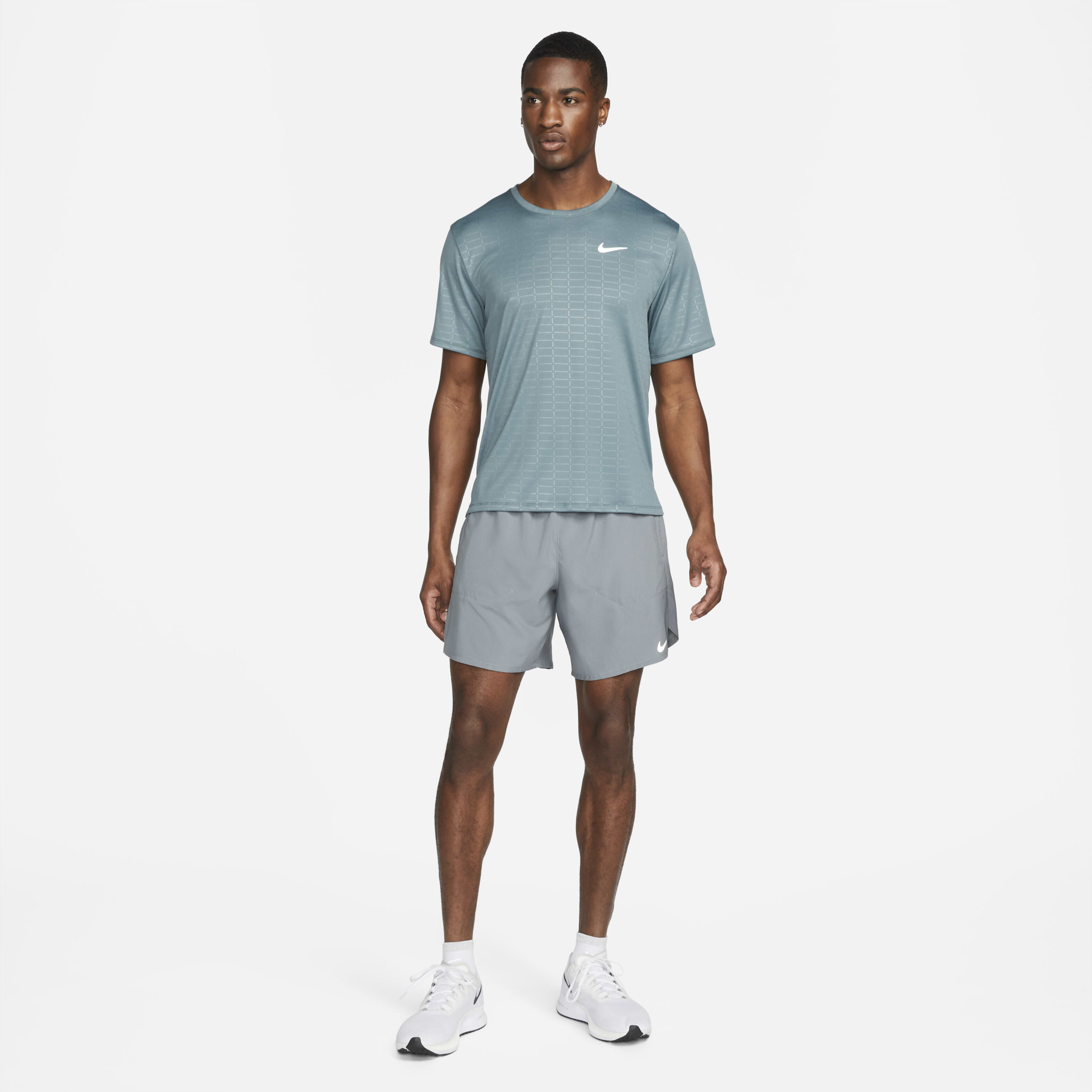 Buy Nike Stride Men s Dri FIT 18cm approx. 2 in 1 Running Shorts Smoke Grey Dark Smoke Grey Black Nike Kuwait Official