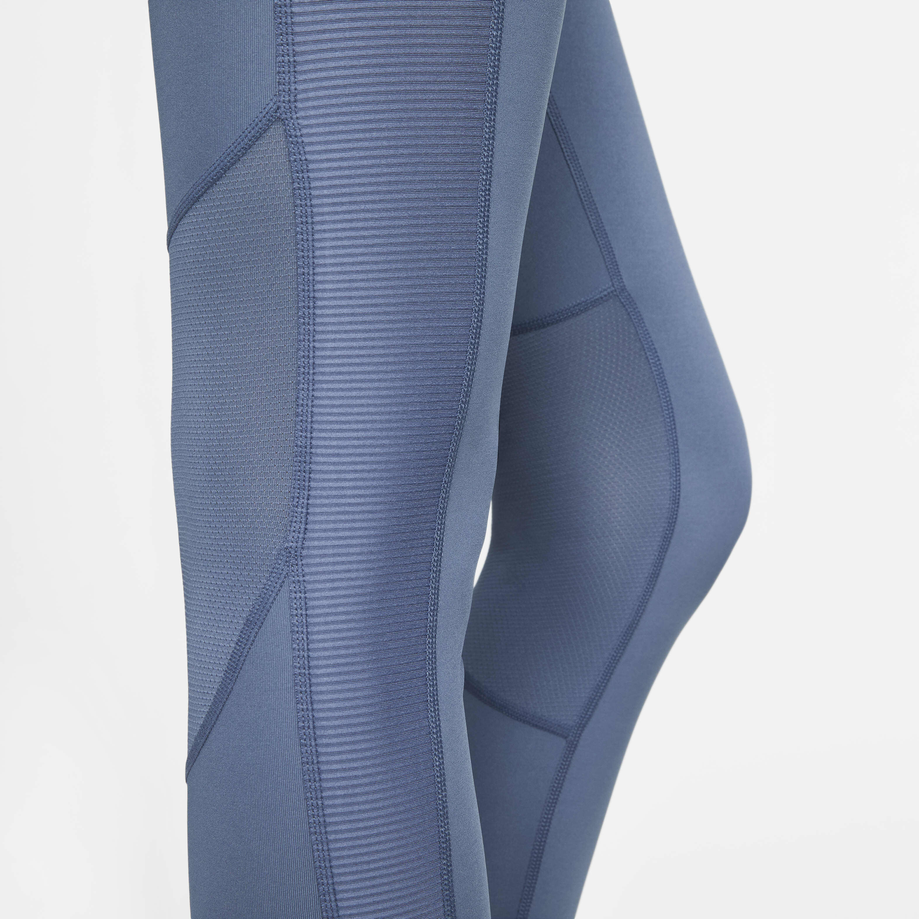 Buy Nike Fast Women s Mid Rise 7 8 Running Leggings with Pockets Diffused Blue Nike Kuwait Official