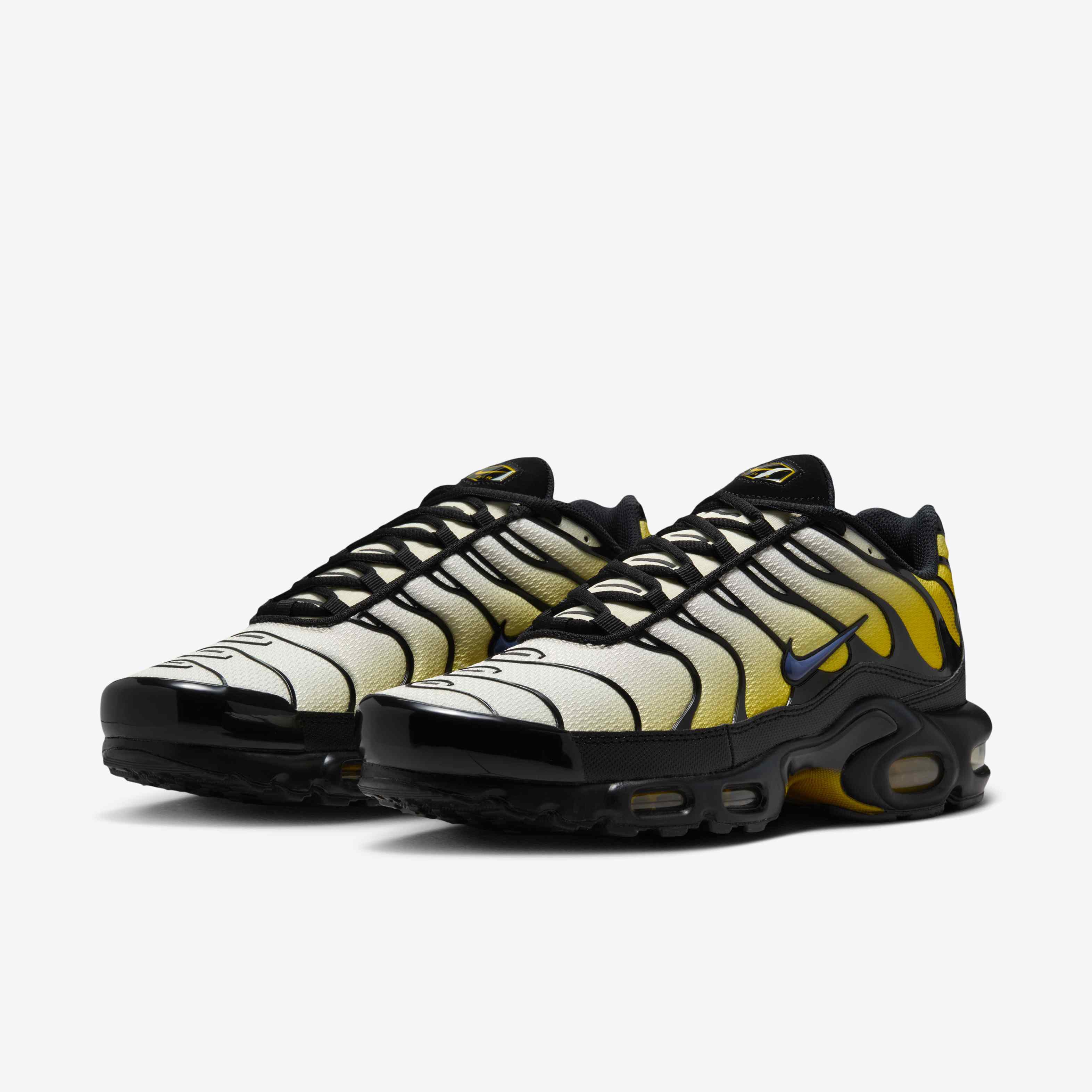 black & yellow air max plus