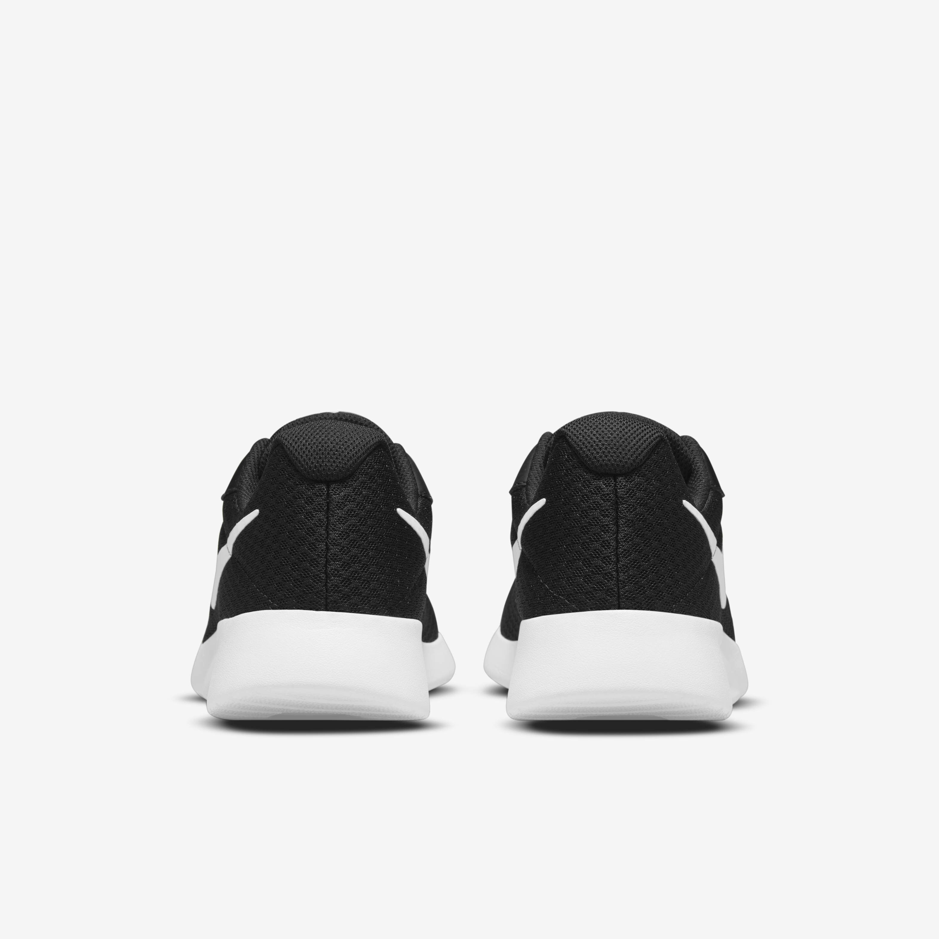 Nike tanjun mens black and gold top