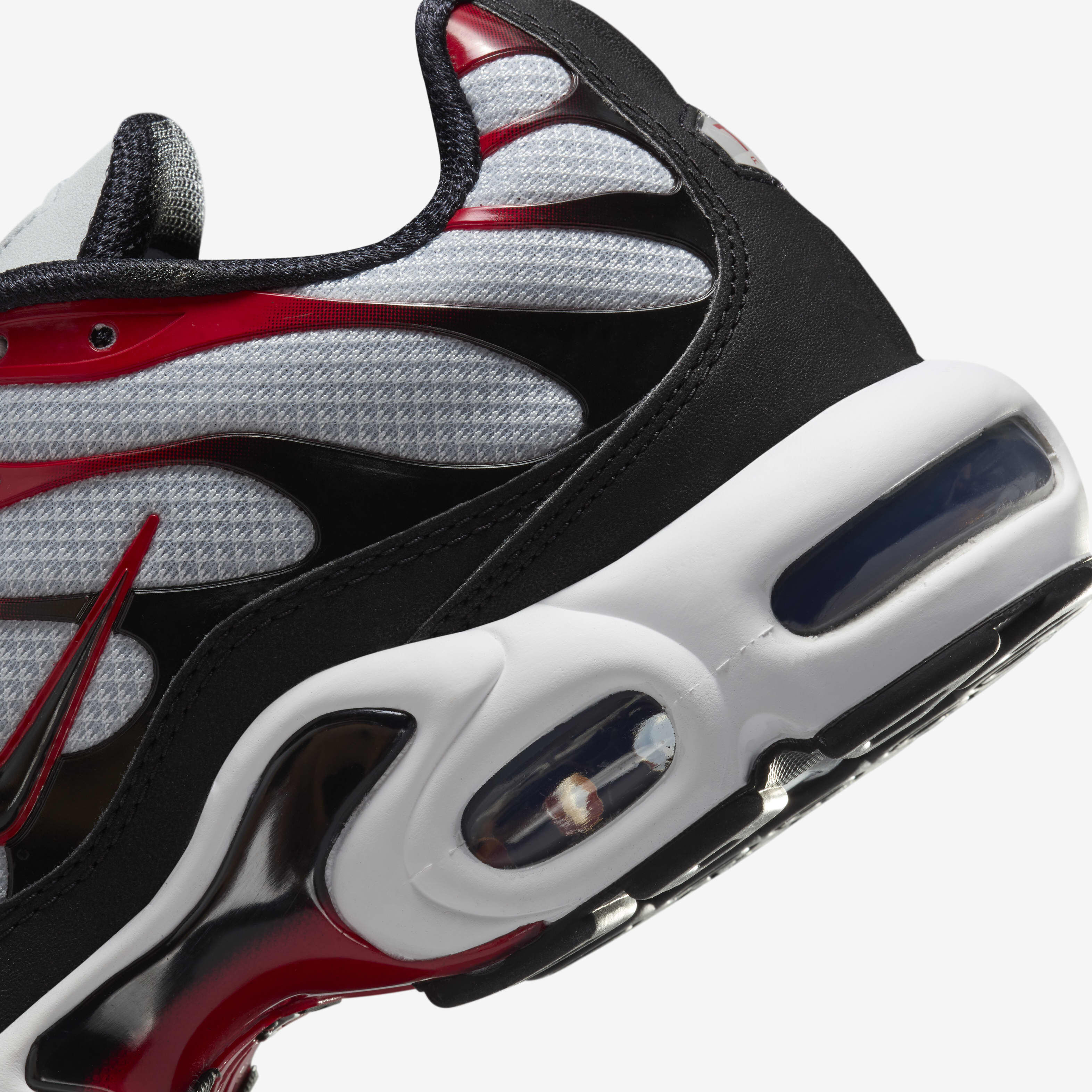 Nike air max plus black university red top