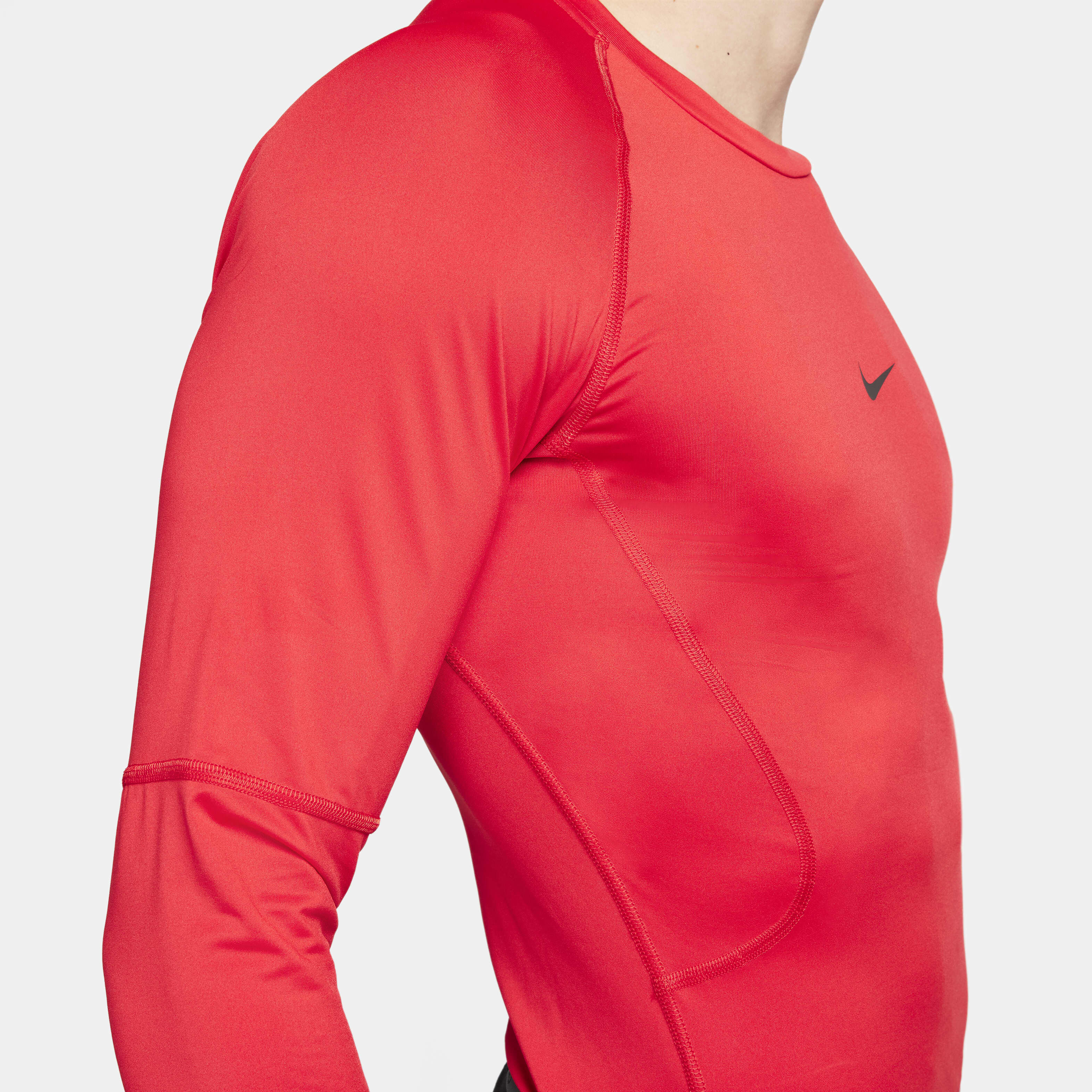 Nike long sleeve top with taped side stripe in red clearance