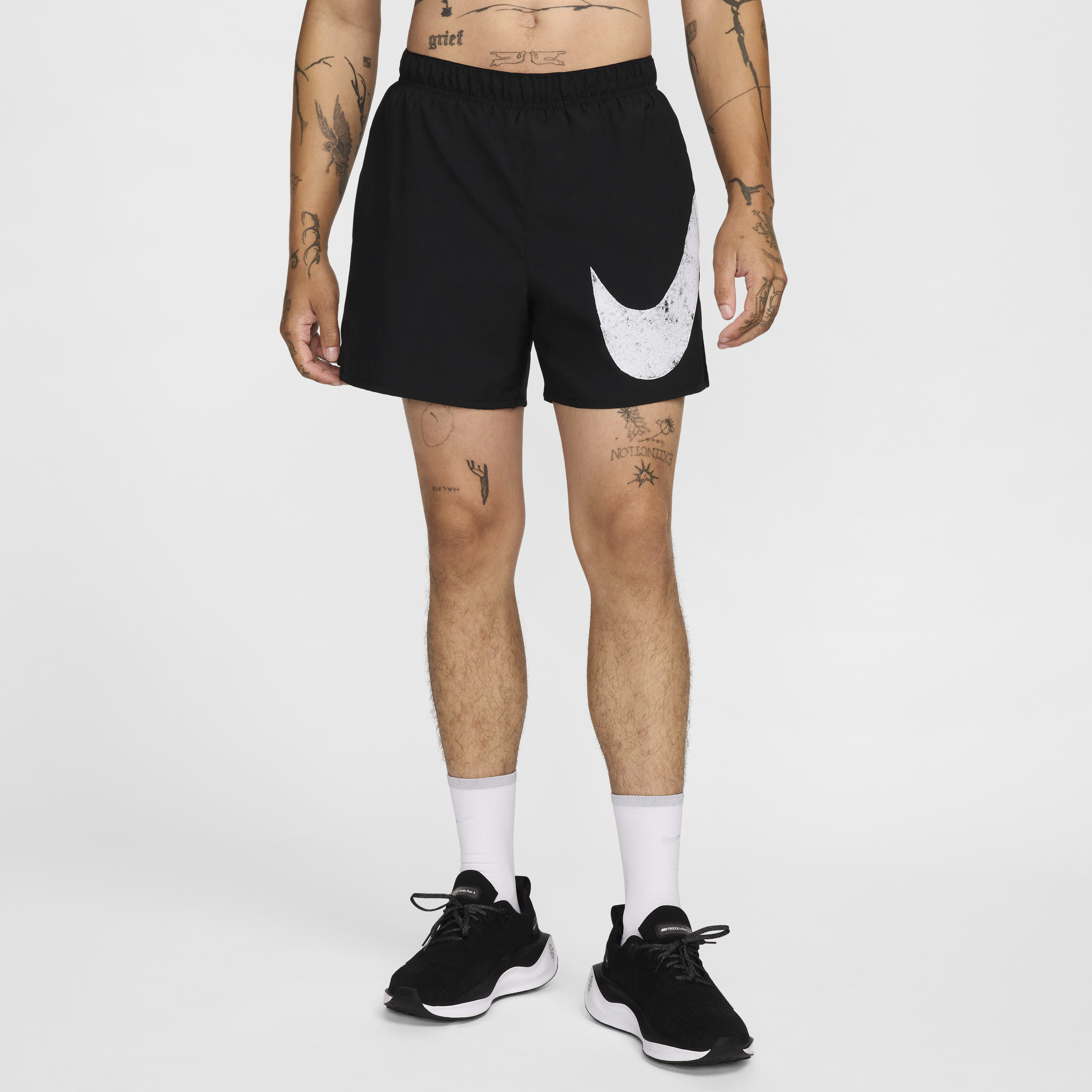 Buy Nike Challenger Swoosh Men s 12.5cm approx. Dri FIT Running Shorts Black Black Black White Nike Kuwait Official