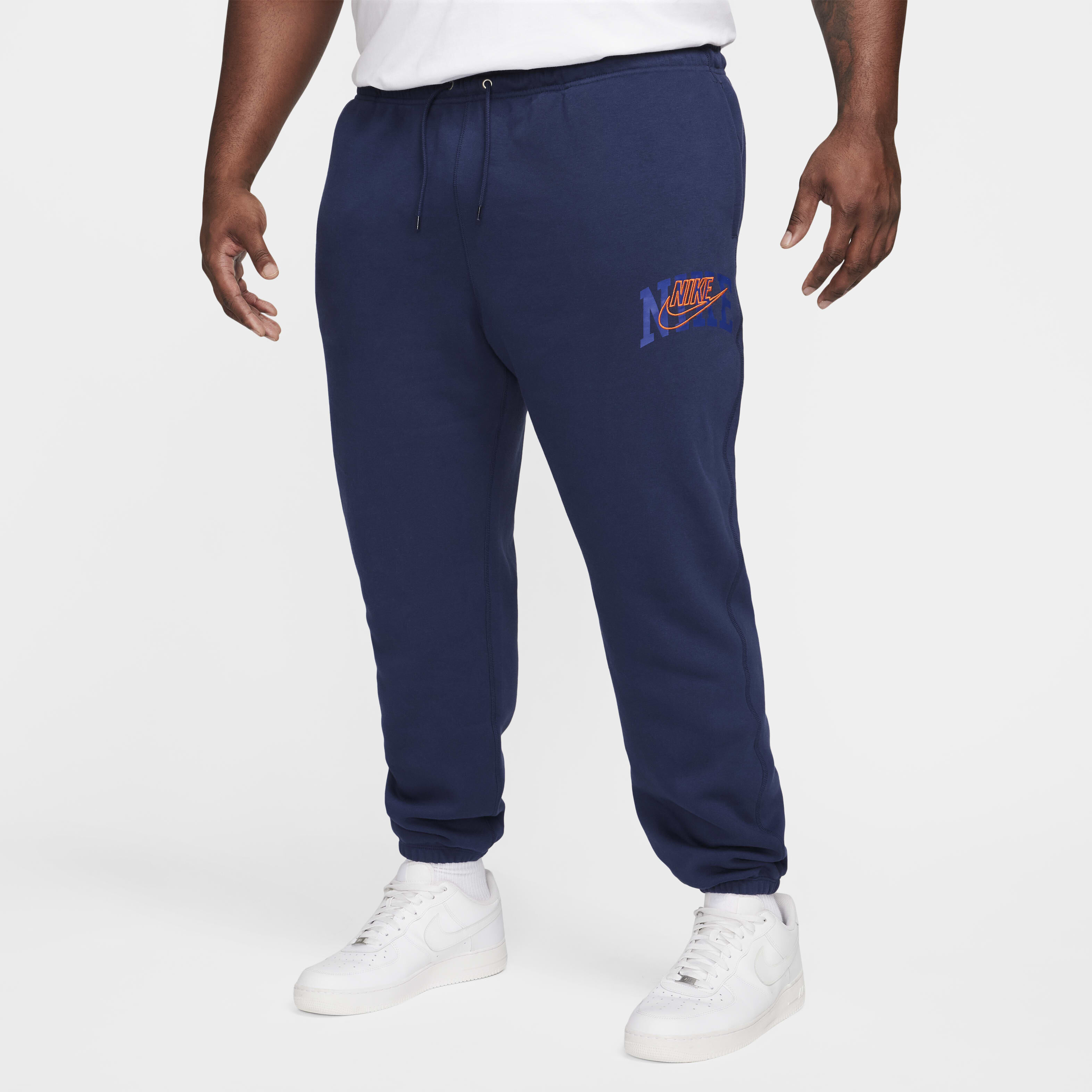 Nike club casual fit cuffed joggers in navy top