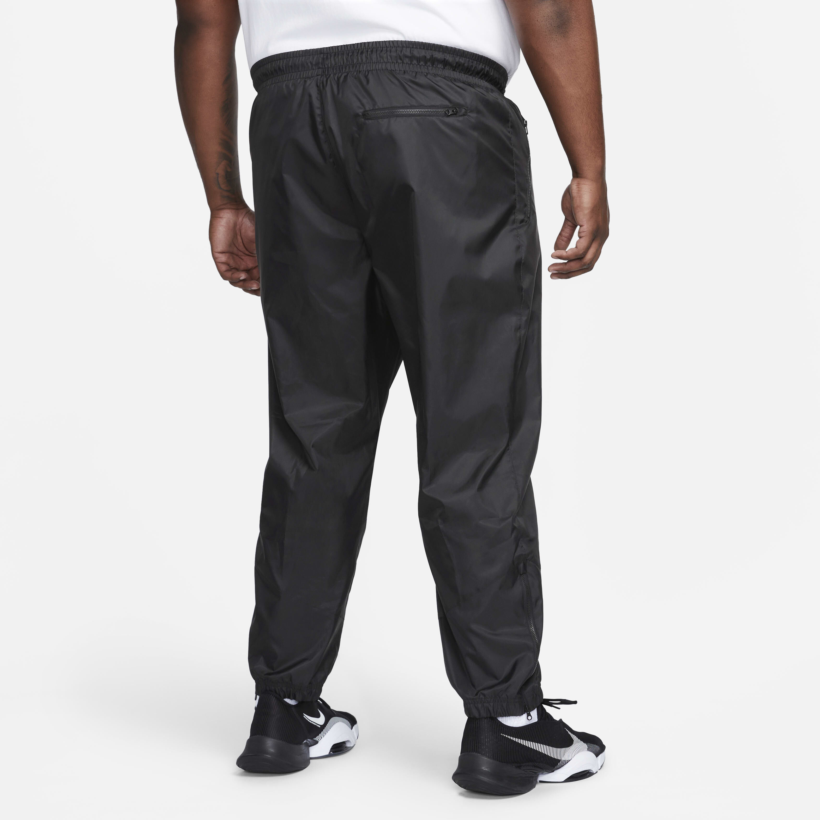 Buy Nike Windrunner Men s Woven Lined Trousers Nike Kuwait Official
