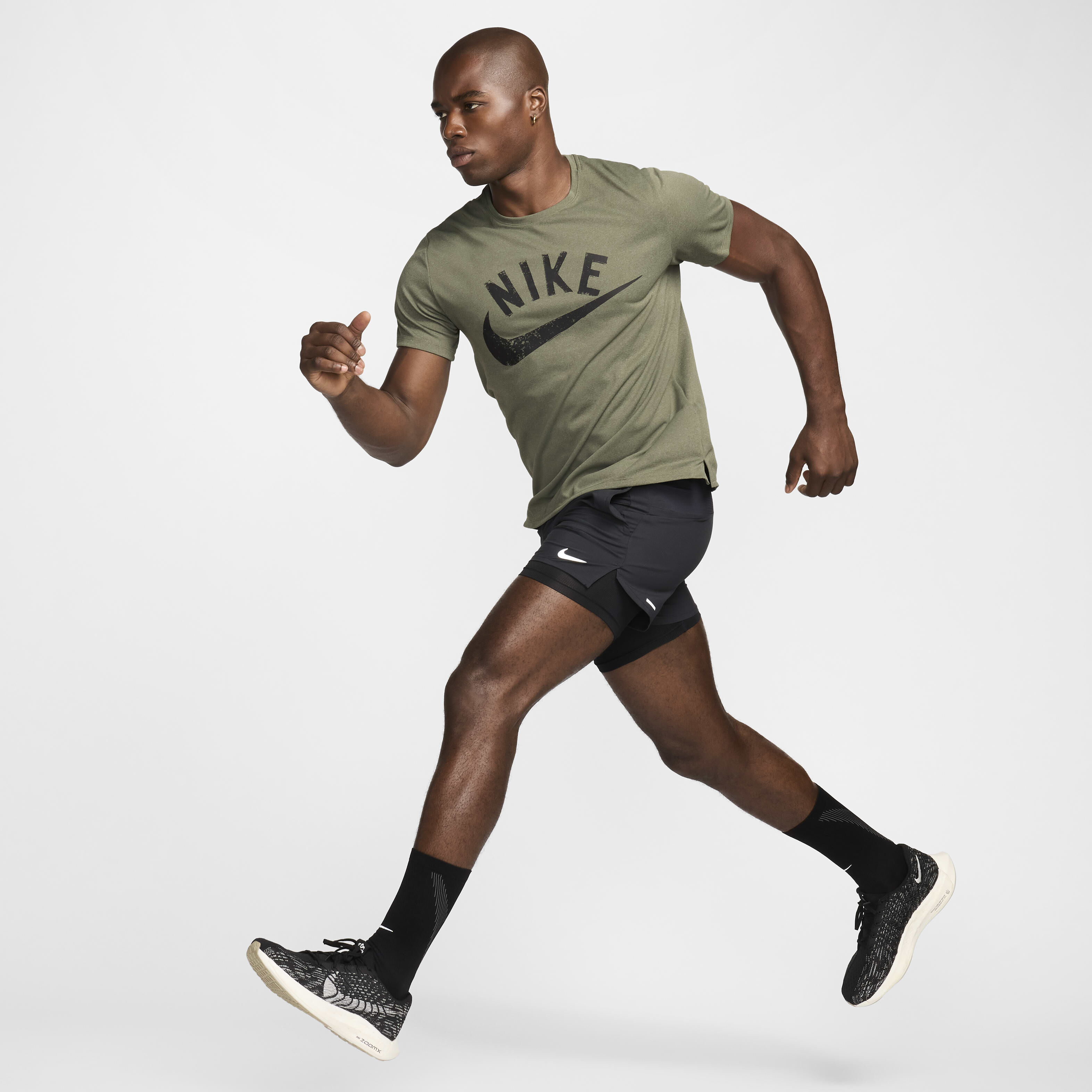 Buy Nike Miler Men s Dri FIT Short Sleeve Running Top Dark Stucco Cargo Khaki Heather Black Nike Kuwait Official