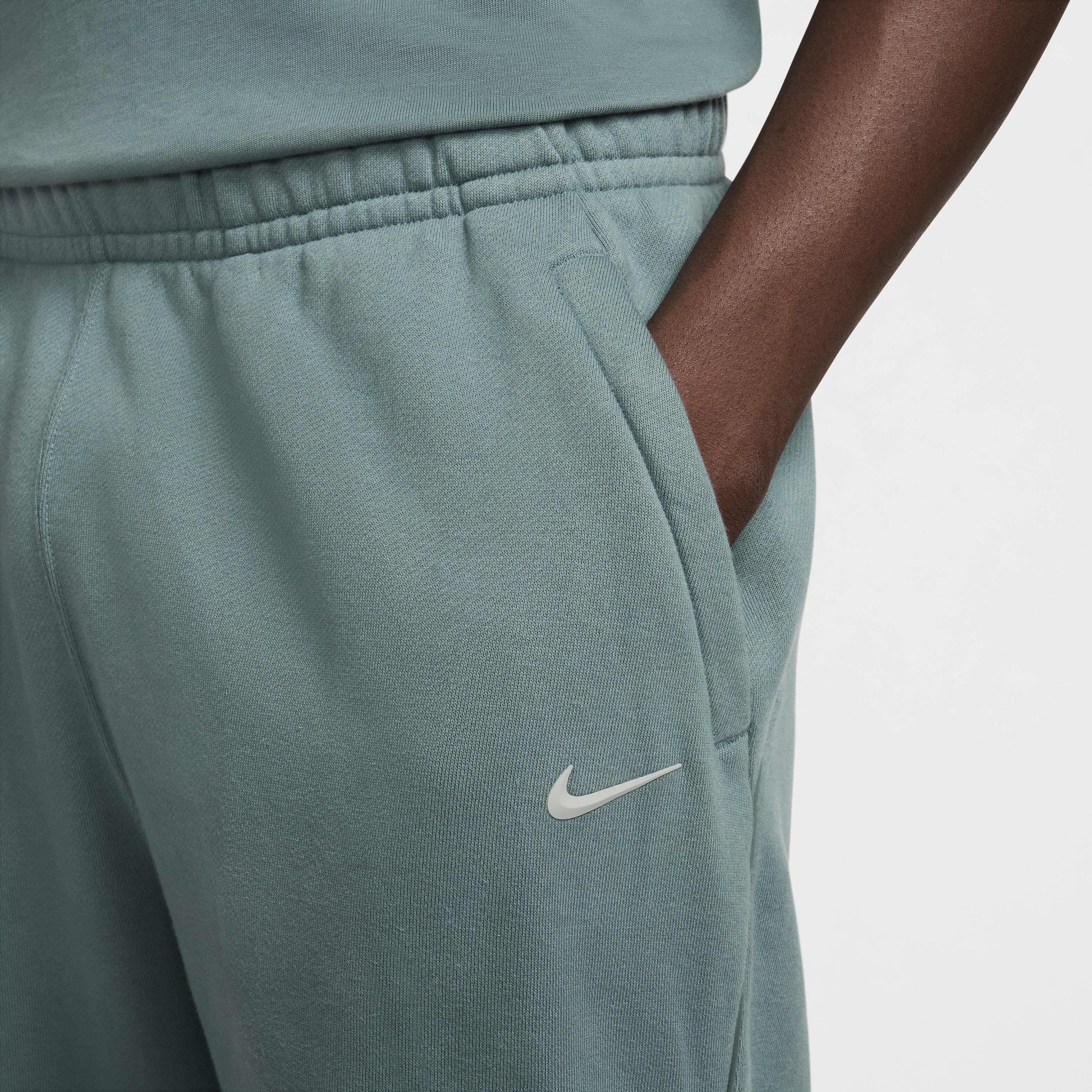 Green nike tracksuit bottoms clearance