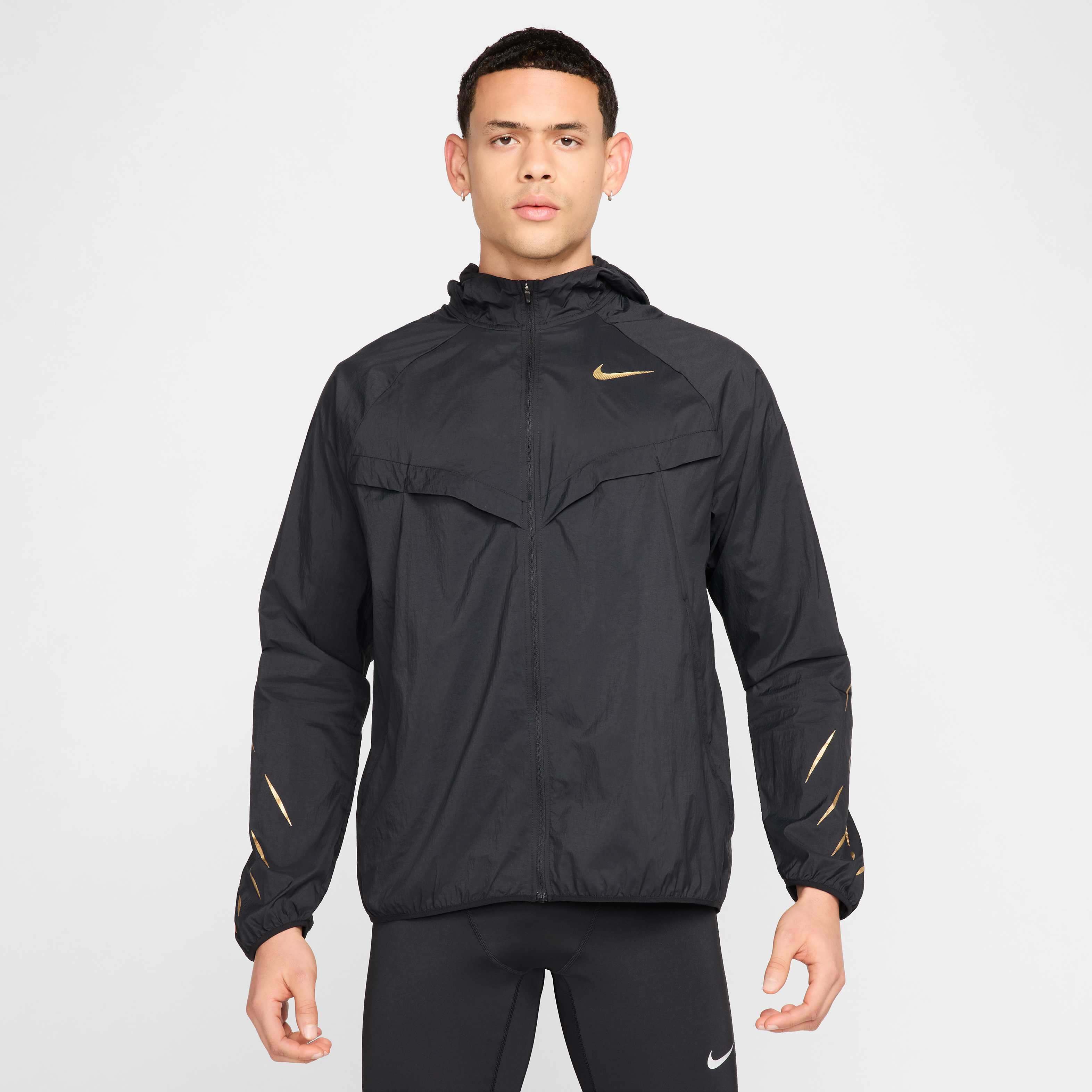 nike jacket black and gold