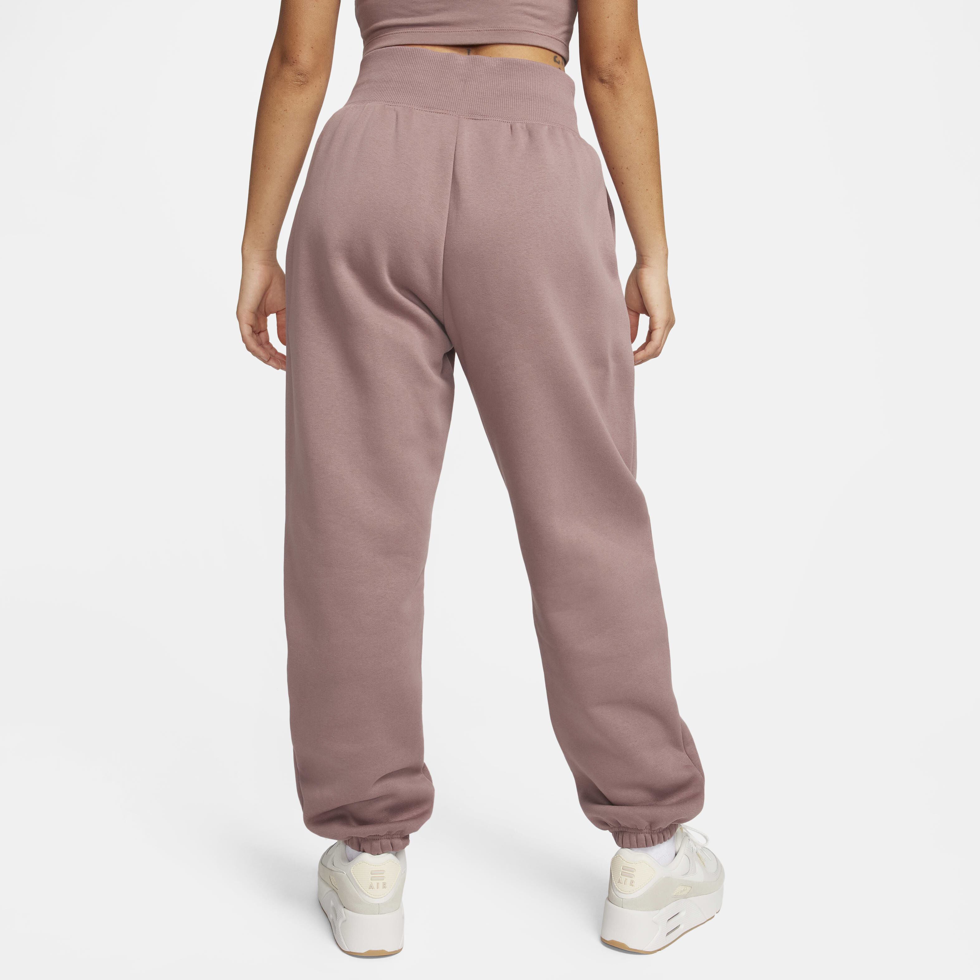 Buy Nike Sportswear Phoenix Fleece Women s High Waisted Oversized Tracksuit Bottoms Smokey Mauve Black Nike Kuwait Official
