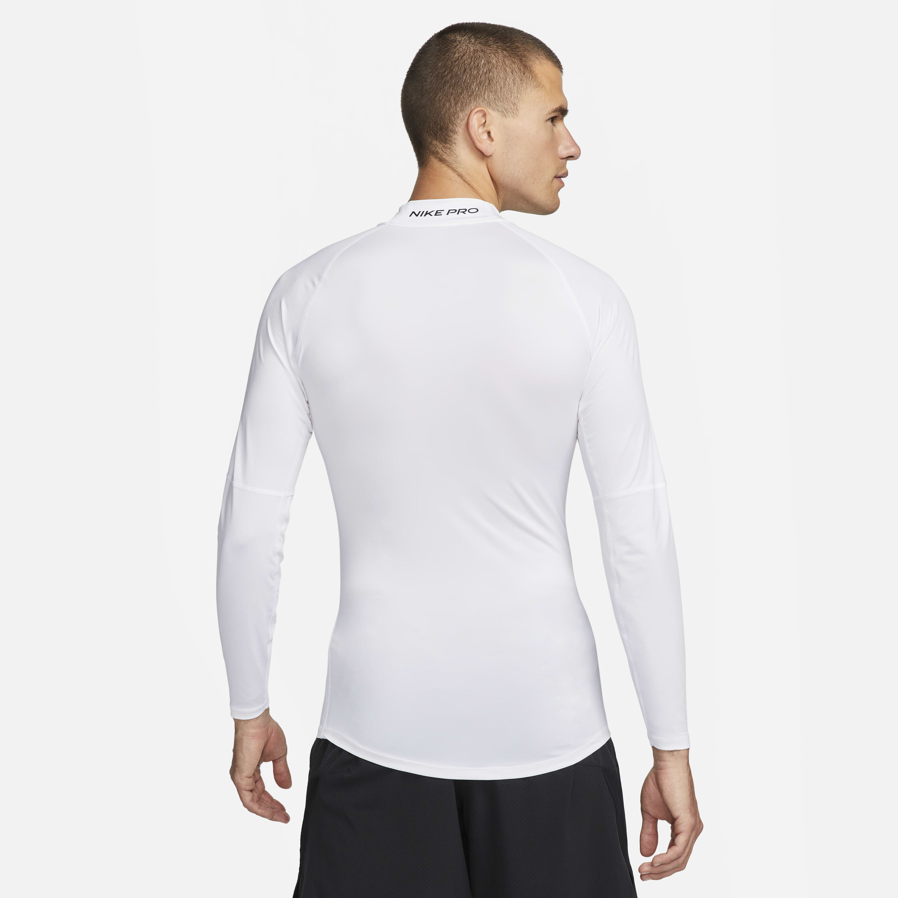 Buy Nike Pro Men s Dri FIT Fitness Mock Neck Long Sleeve Top White Black Nike Kuwait Official