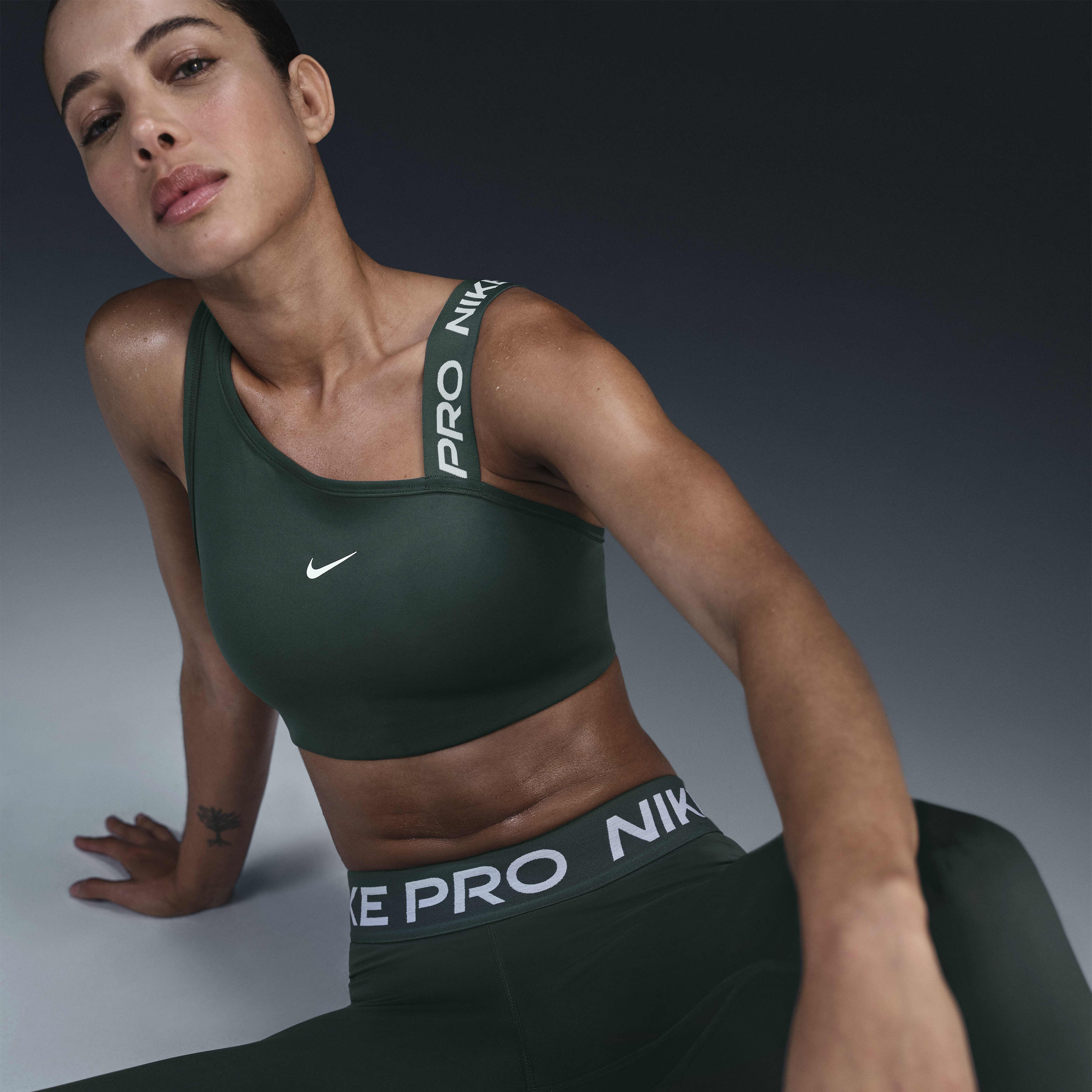 Buy Nike Pro Swoosh Asymmetrical Women s Medium Support Padded Sports Bra Vintage Green Vintage Green White White Nike Kuwait Official