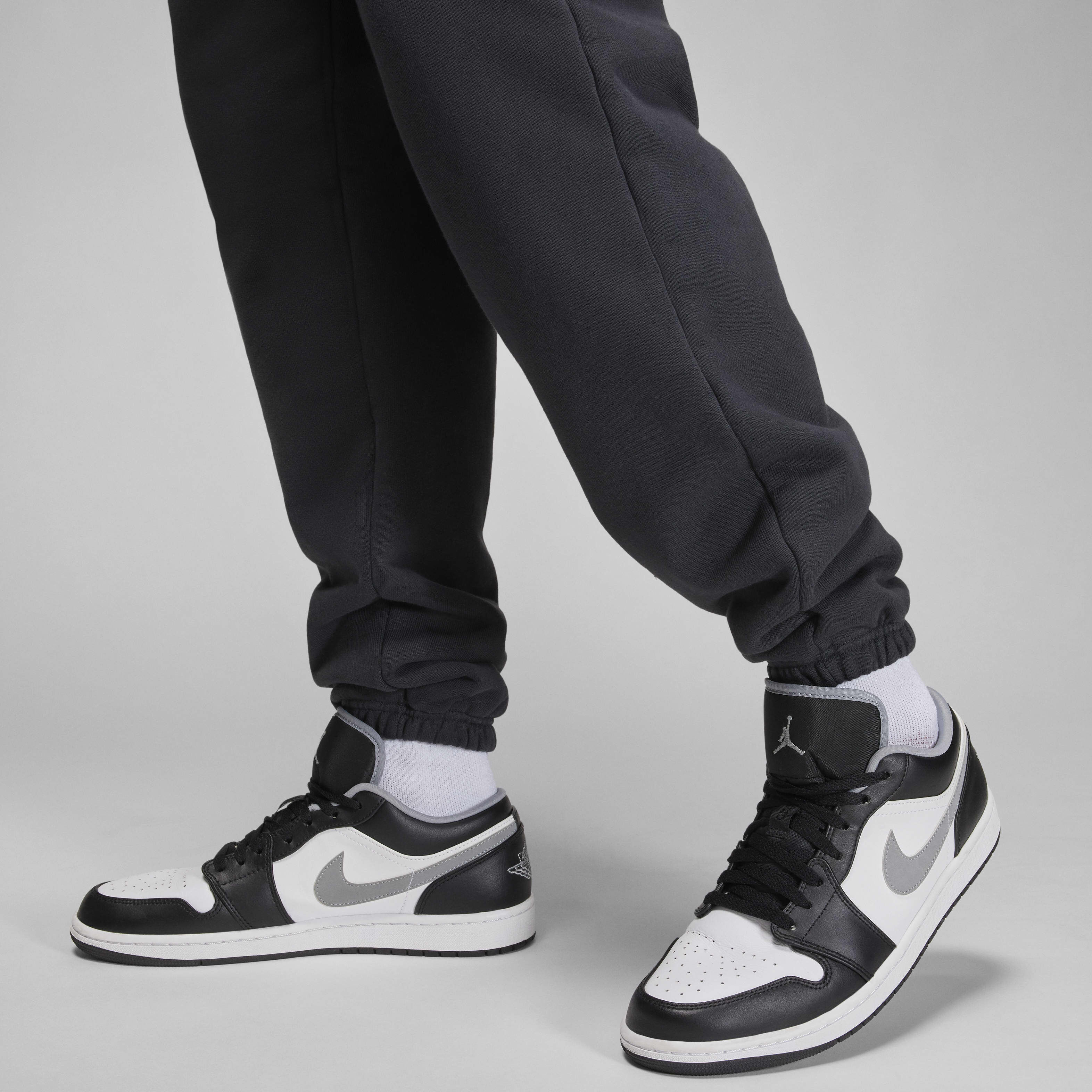 Buy Jordan Wordmark Men's Fleece Trousers - Off-Noir | Nike