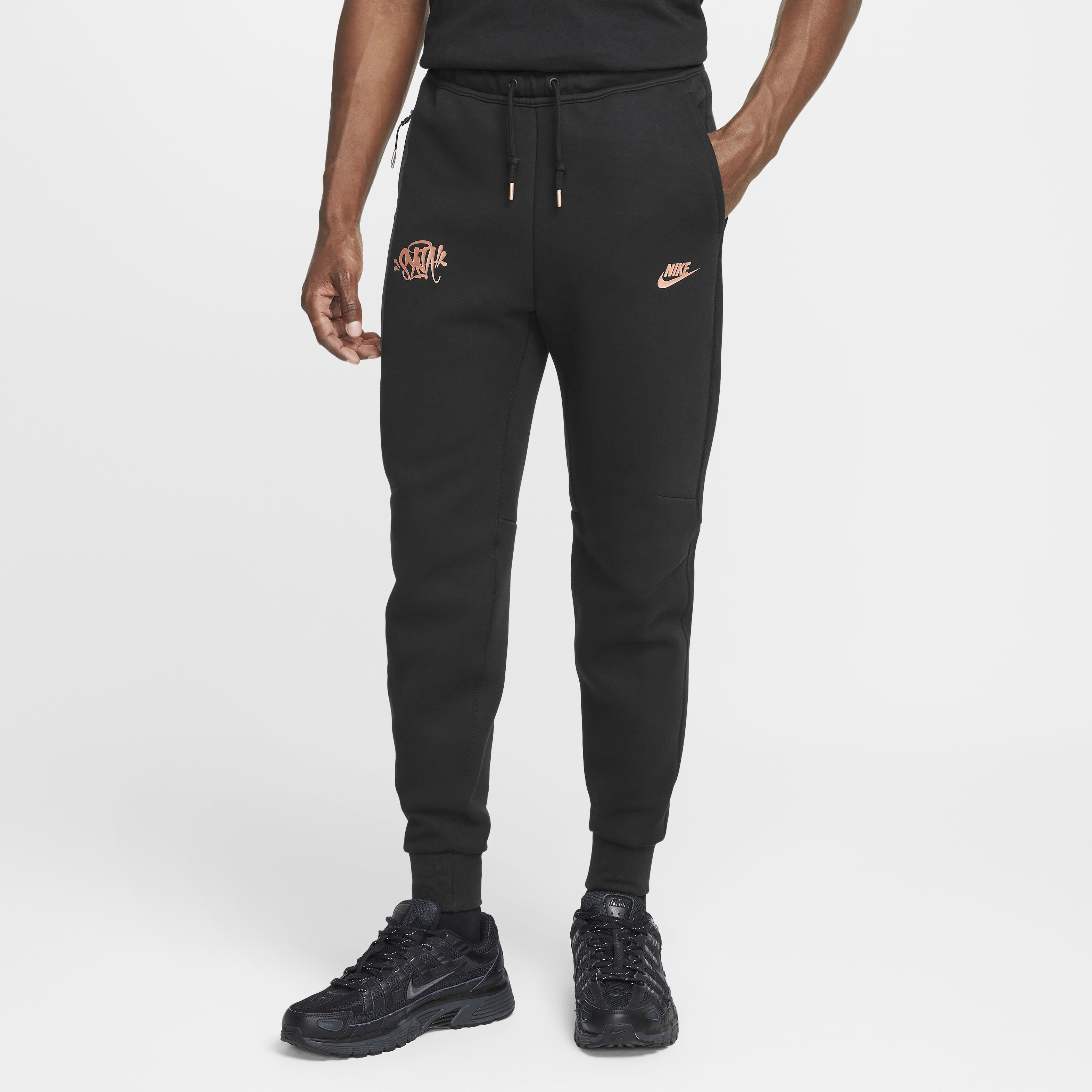 Buy Nike Tech Fleece x Central Cee Men s Joggers Black Metallic Red Bronze Nike Kuwait Official