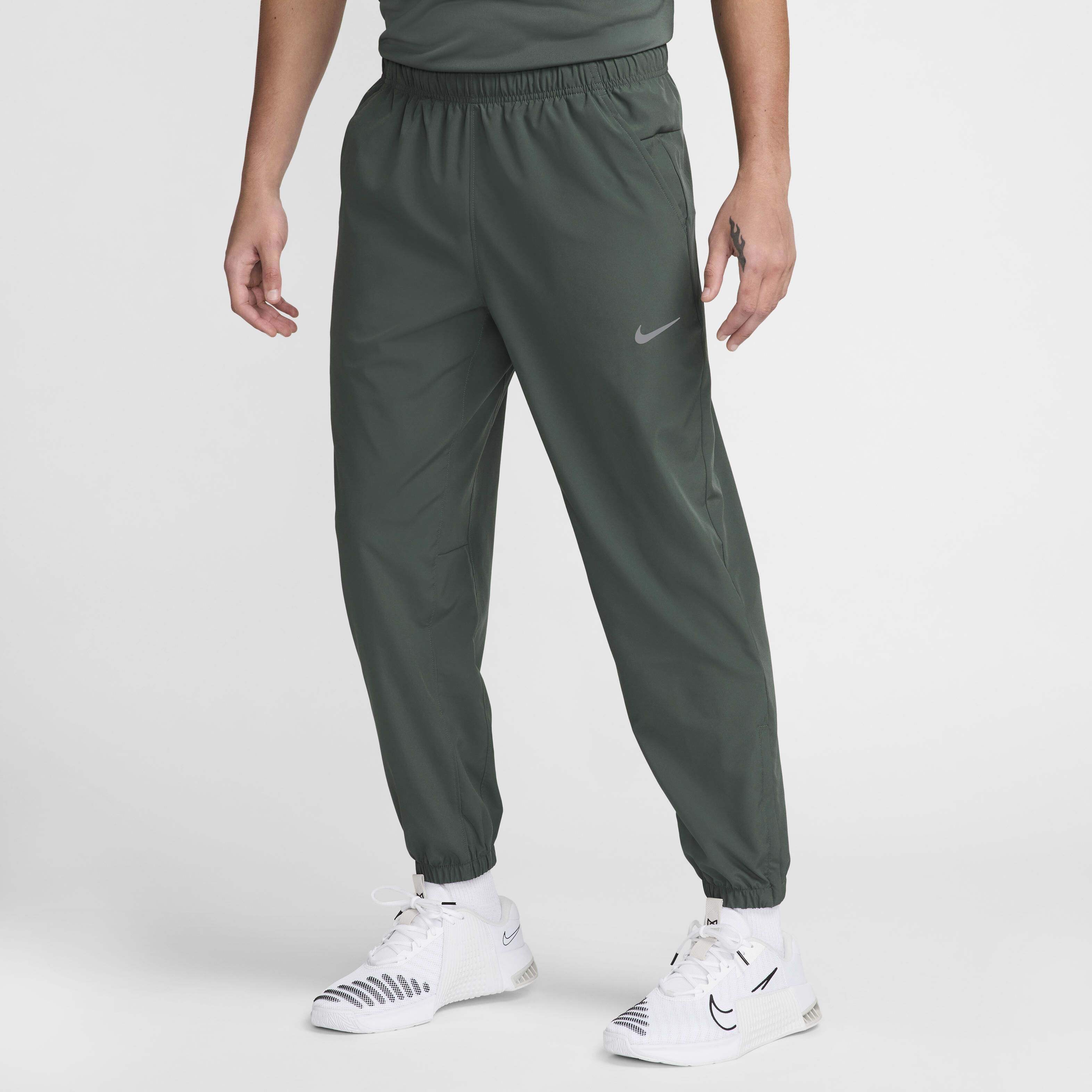 Buy Nike Form Men s Dri FIT Tapered Versatile Trousers Nike Kuwait Official