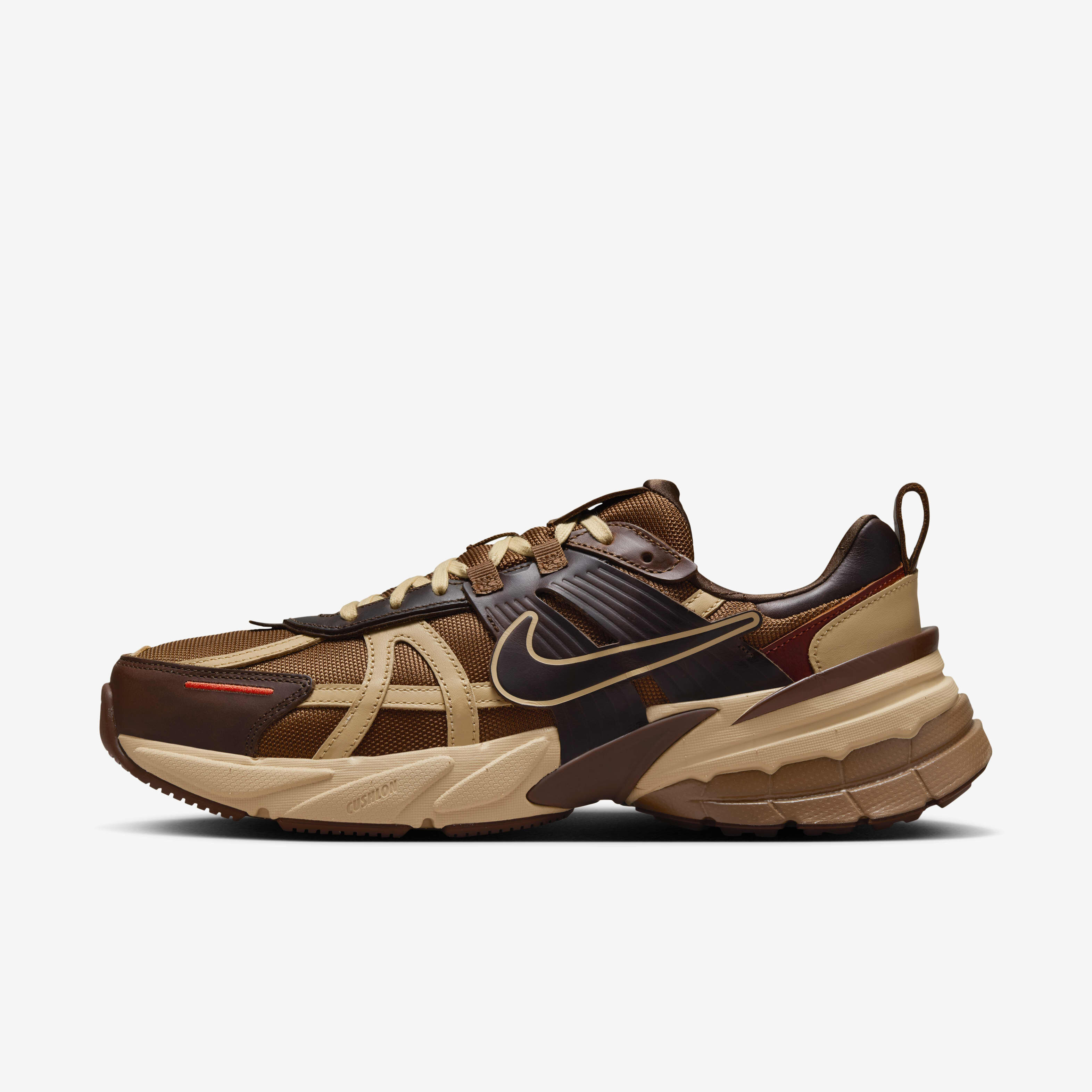 tan and red nike shoes