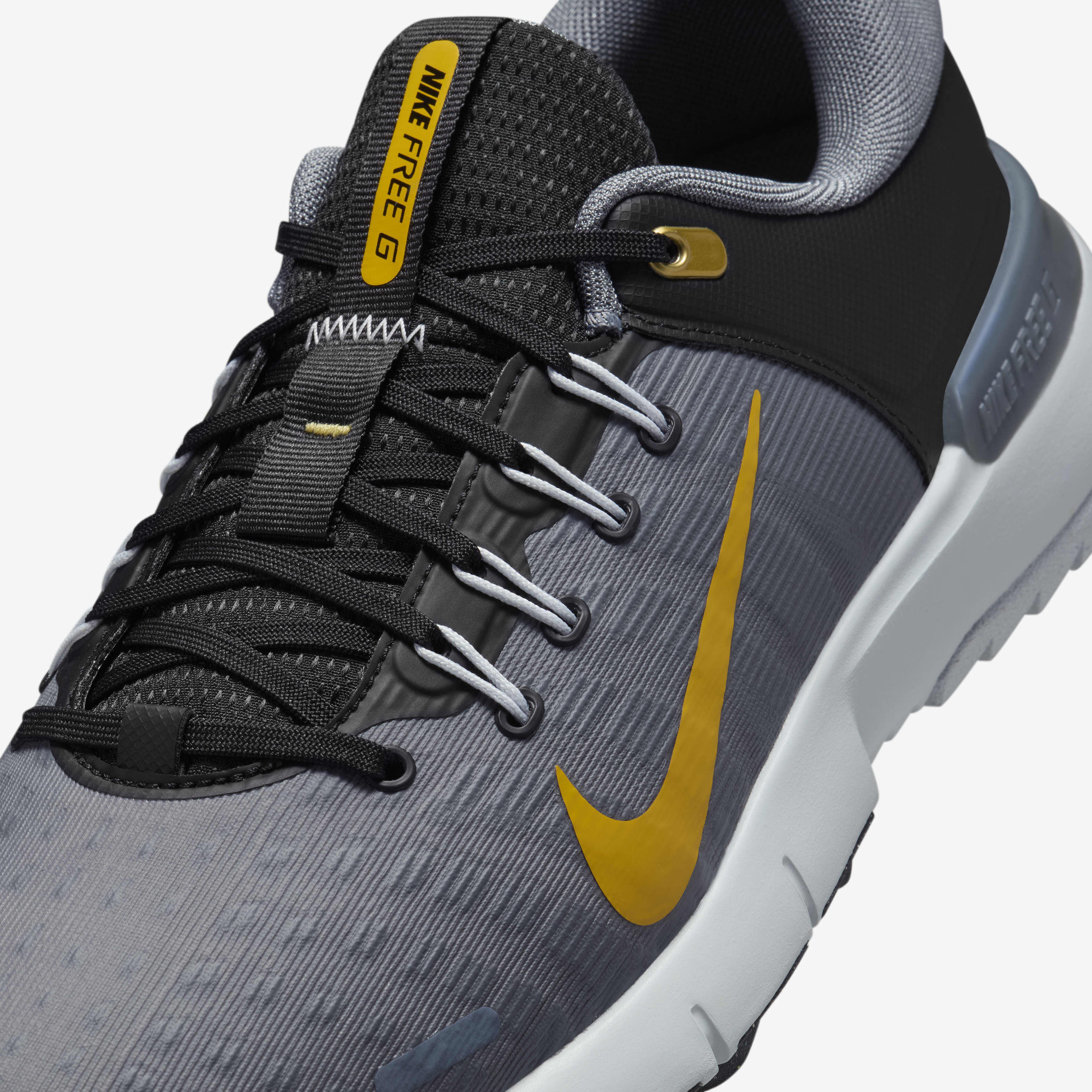 Black and gold nike golf shoes 2025