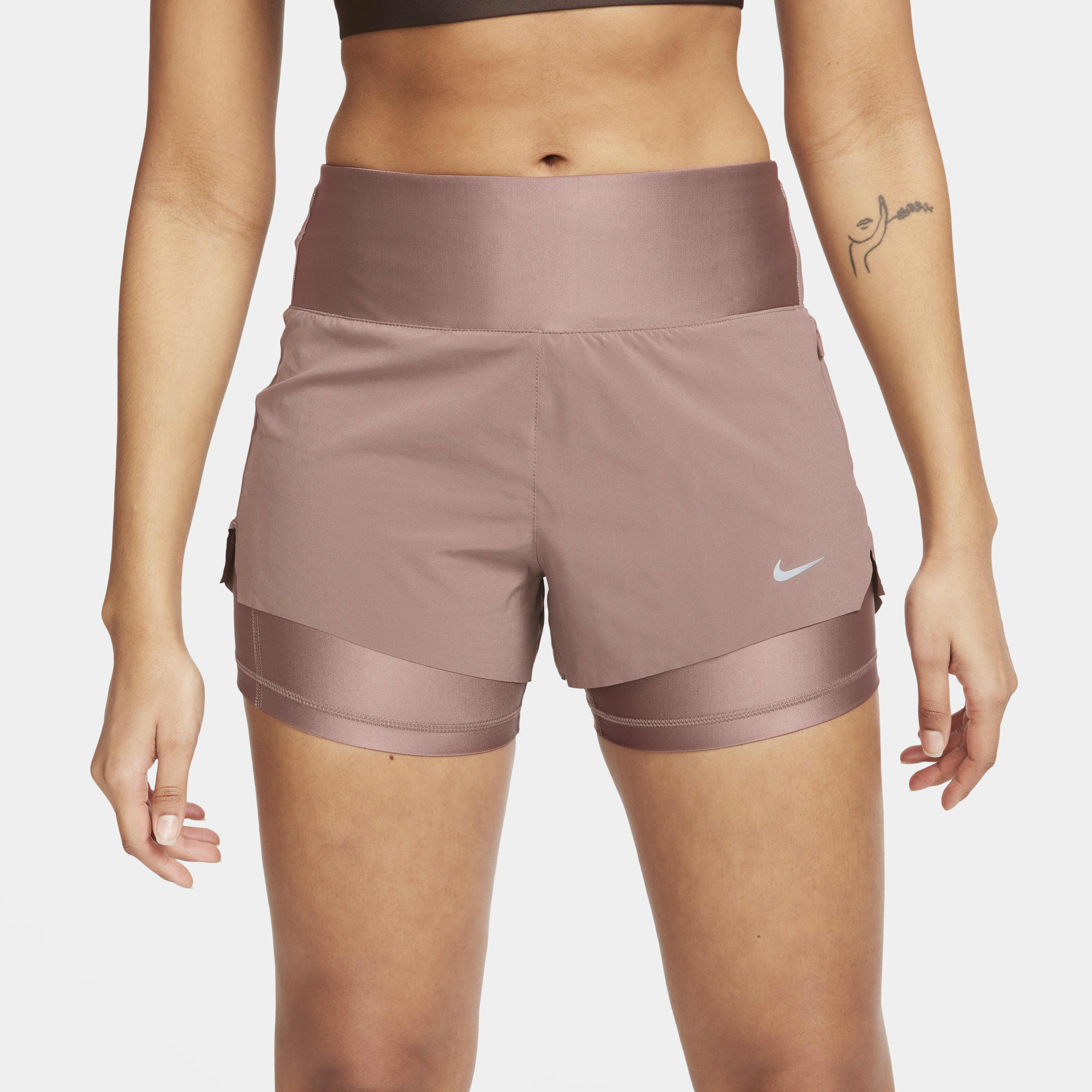 Buy Nike Dri FIT Swift Women s Mid Rise 8cm approx. 2 in 1 Running Shorts with Pockets Smokey Mauve Nike Kuwait Official