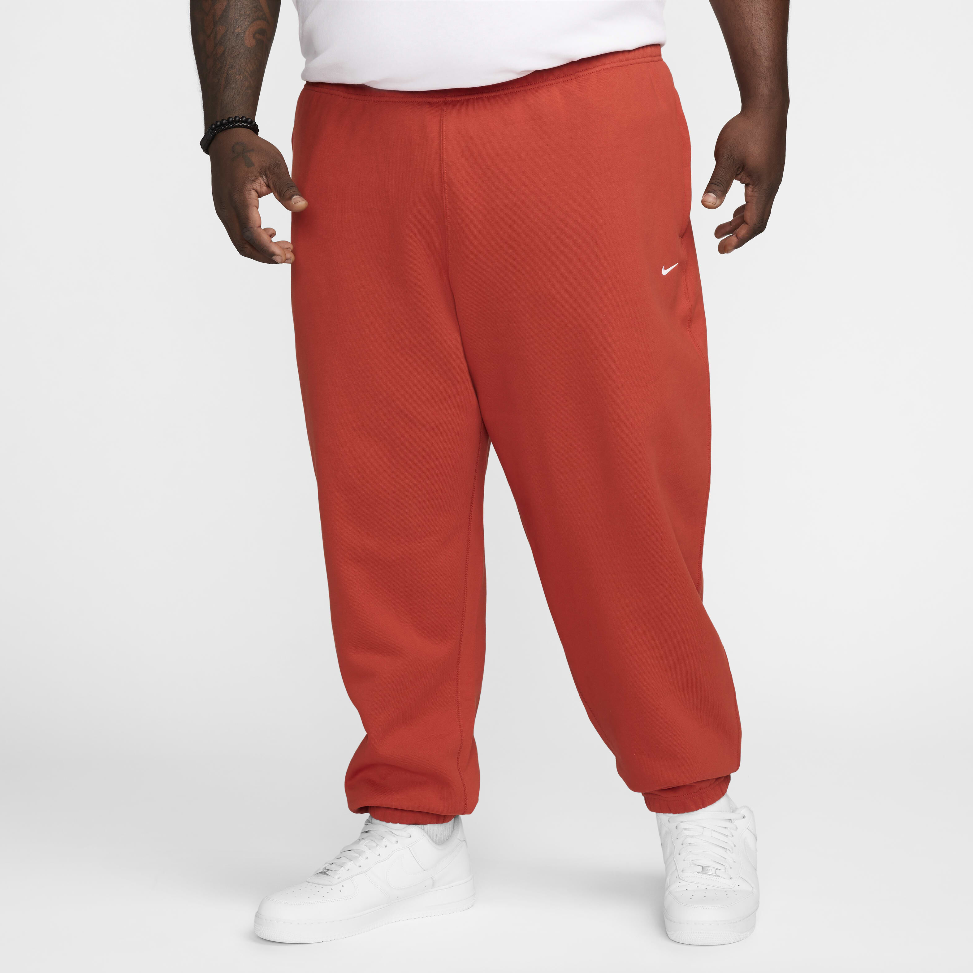 Buy Nike Solo Swoosh Men s Fleece Trousers Dragon Red White Nike Kuwait Official