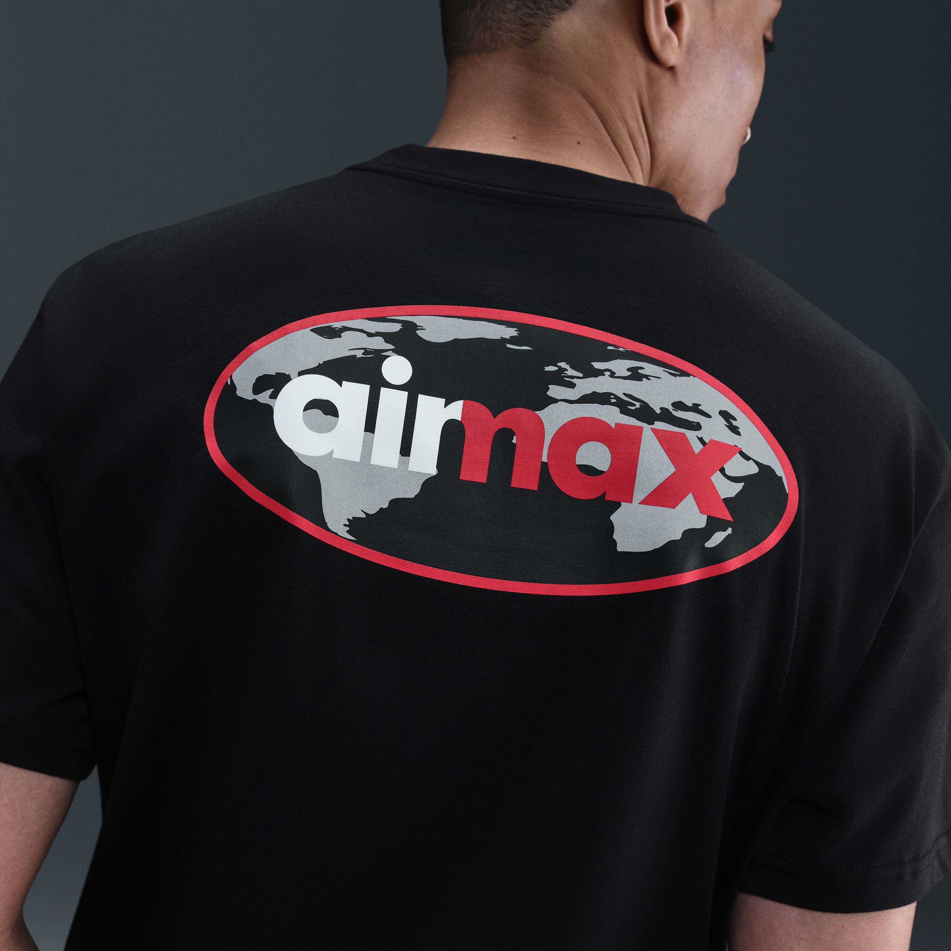 black nike shirt with red logo