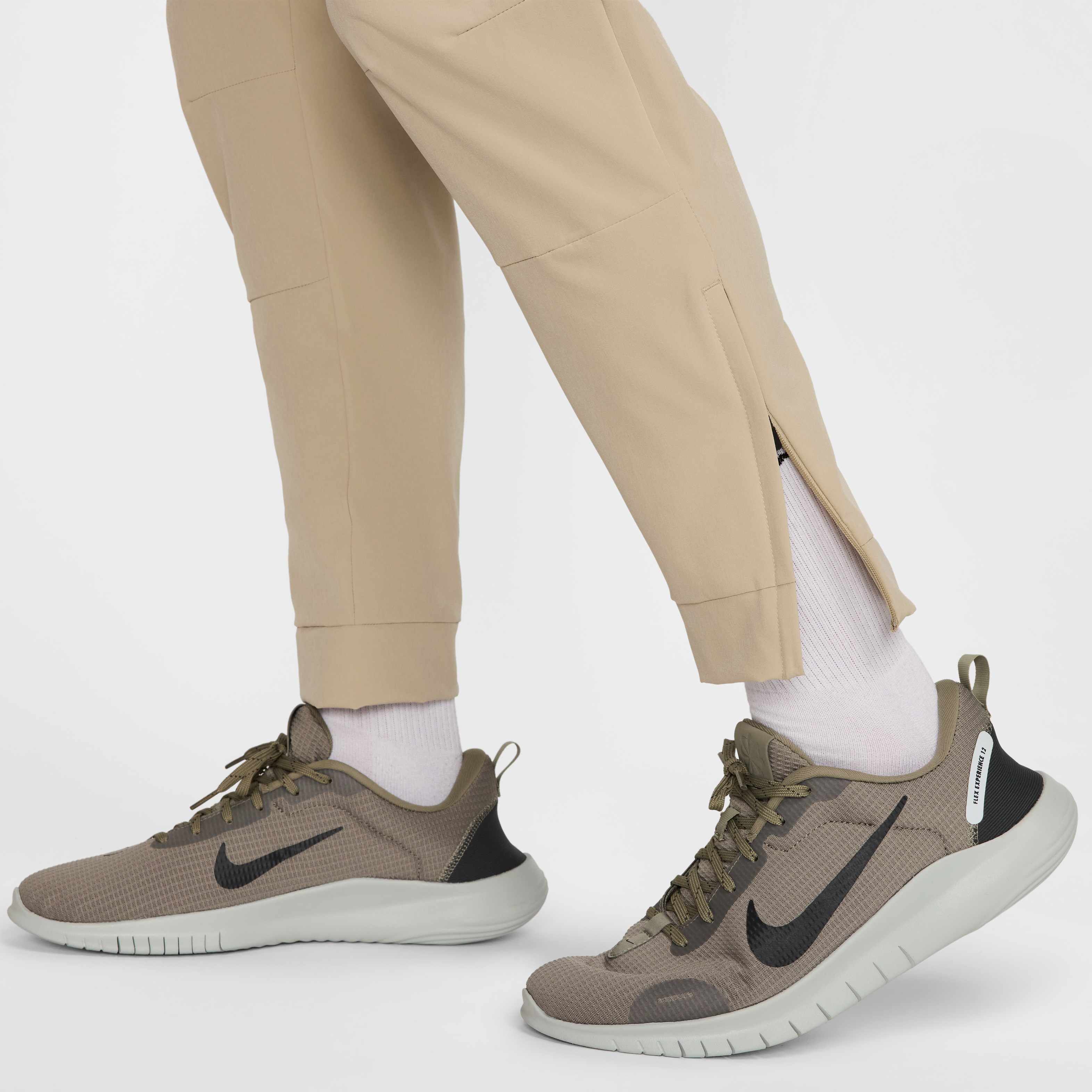 Buy Nike Unlimited Men's Dri-FIT Zip Cuff Versatile Trousers