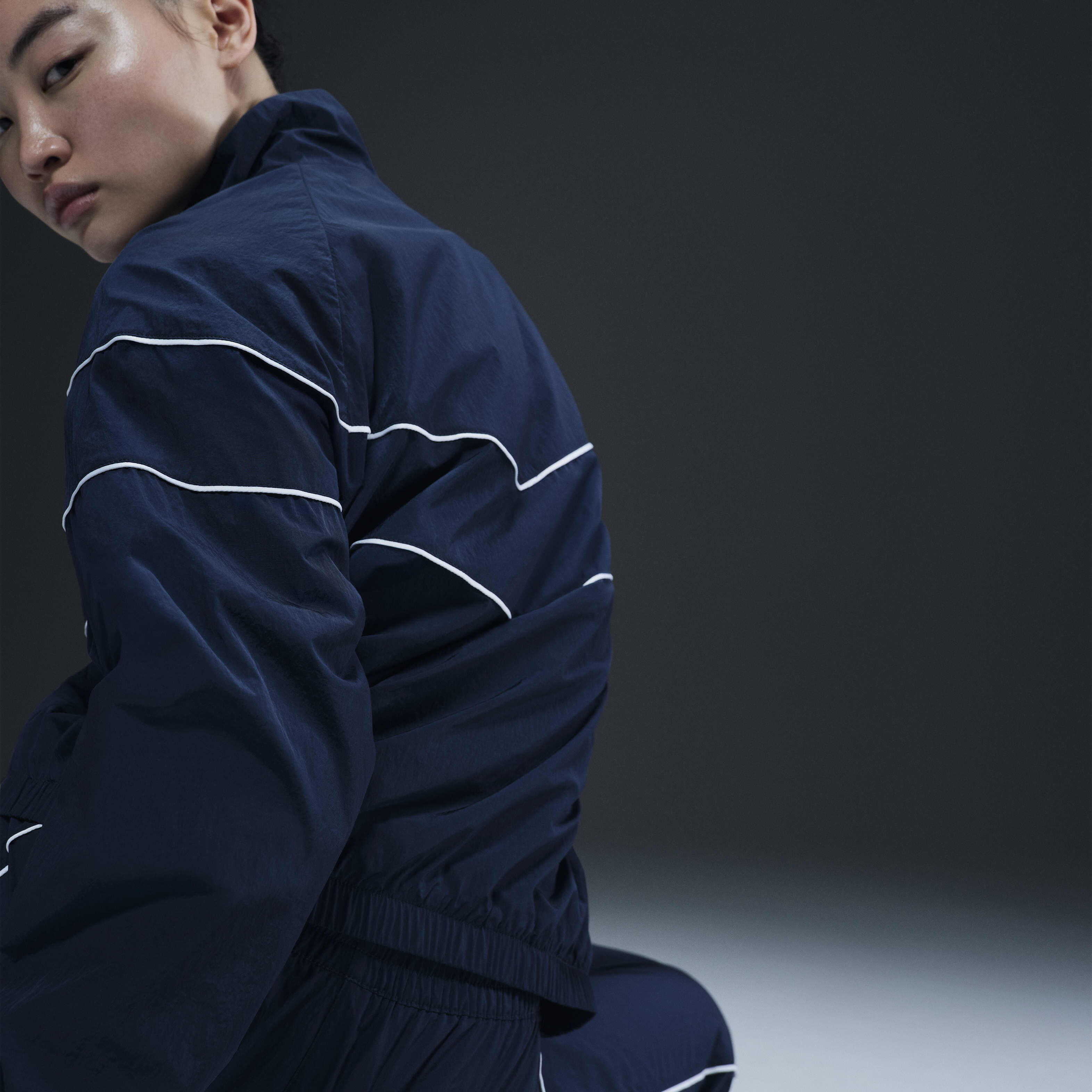 Buy Nike Windrunner Women s Loose UV Woven Full Zip Jacket Armoury Navy White Nike Kuwait Official