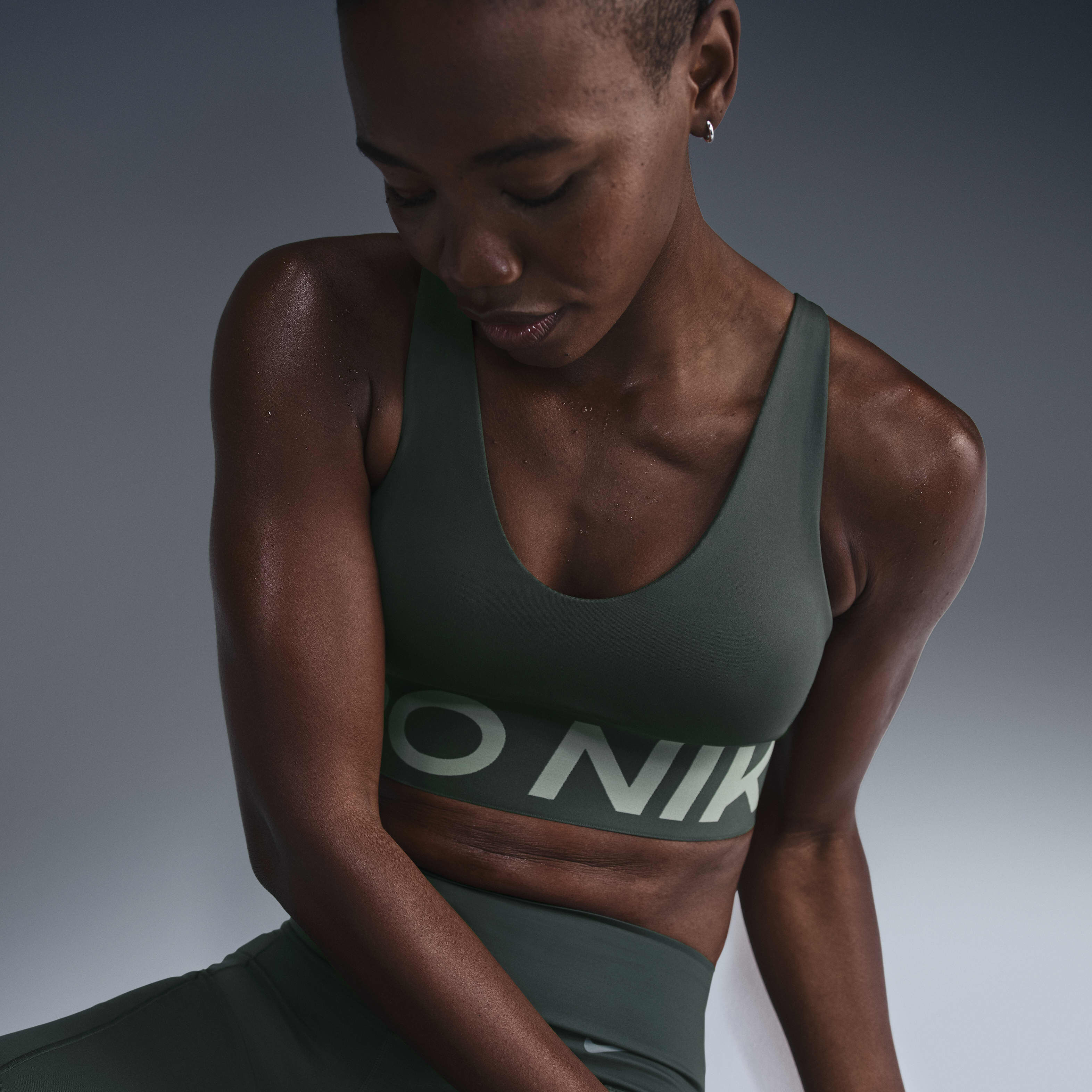 Buy Nike Pro Indy Plunge Women s Medium Support Padded Sports Bra Vintage Green Jade Horizon White Nike Kuwait Official