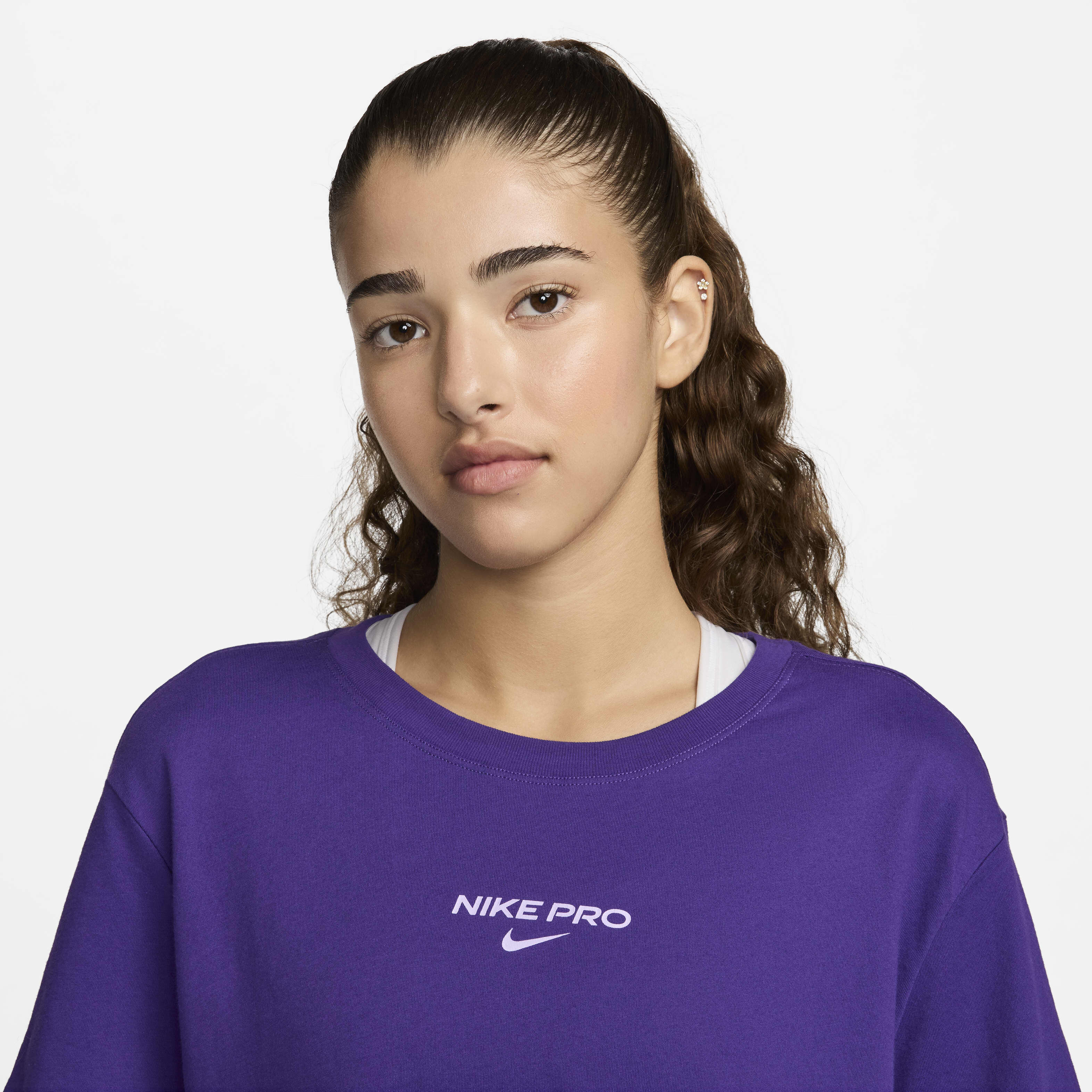Buy Nike Pro Women s Dri FIT Short Sleeve Cropped Tee Court Purple Nike Kuwait Official