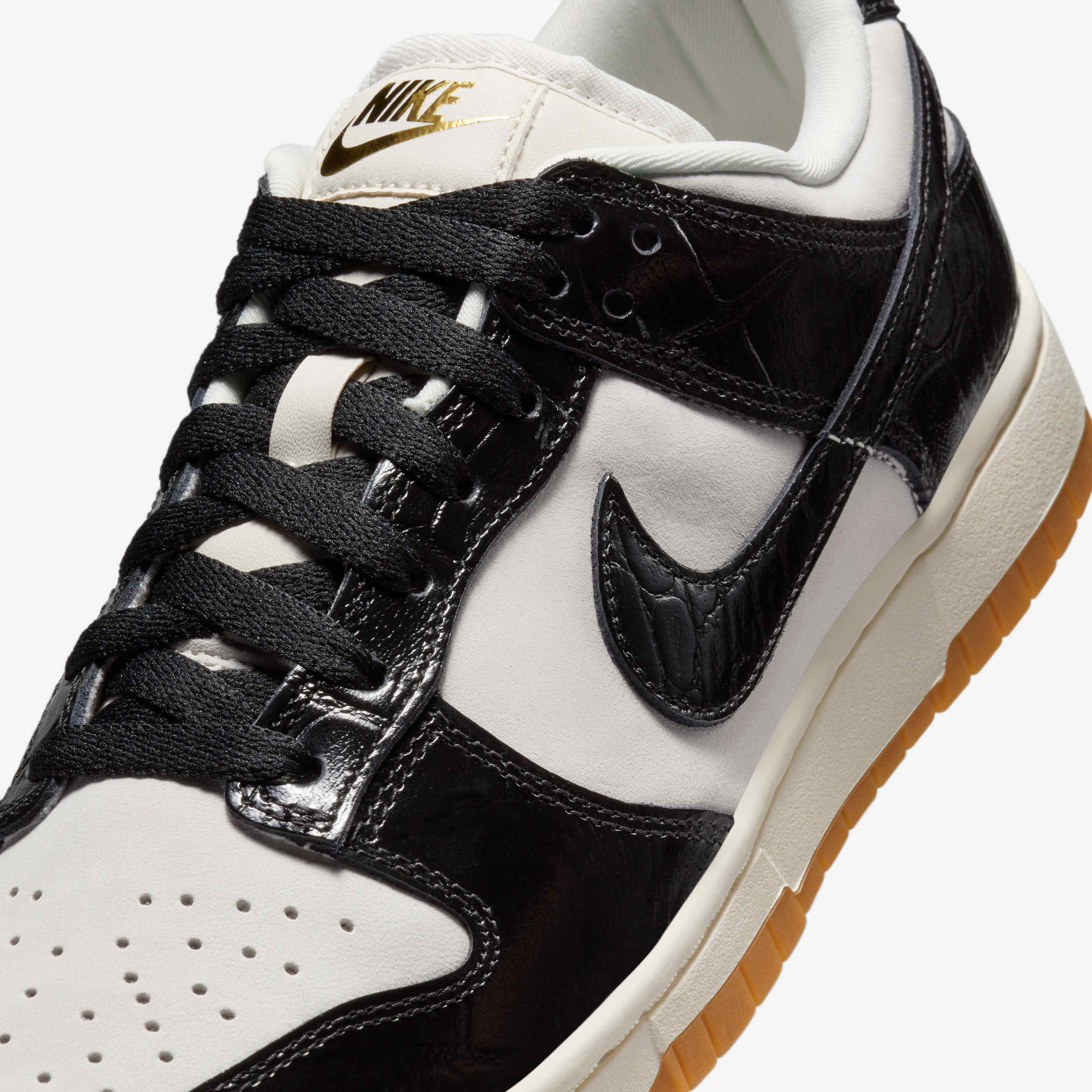 goat nike dunk low black and white