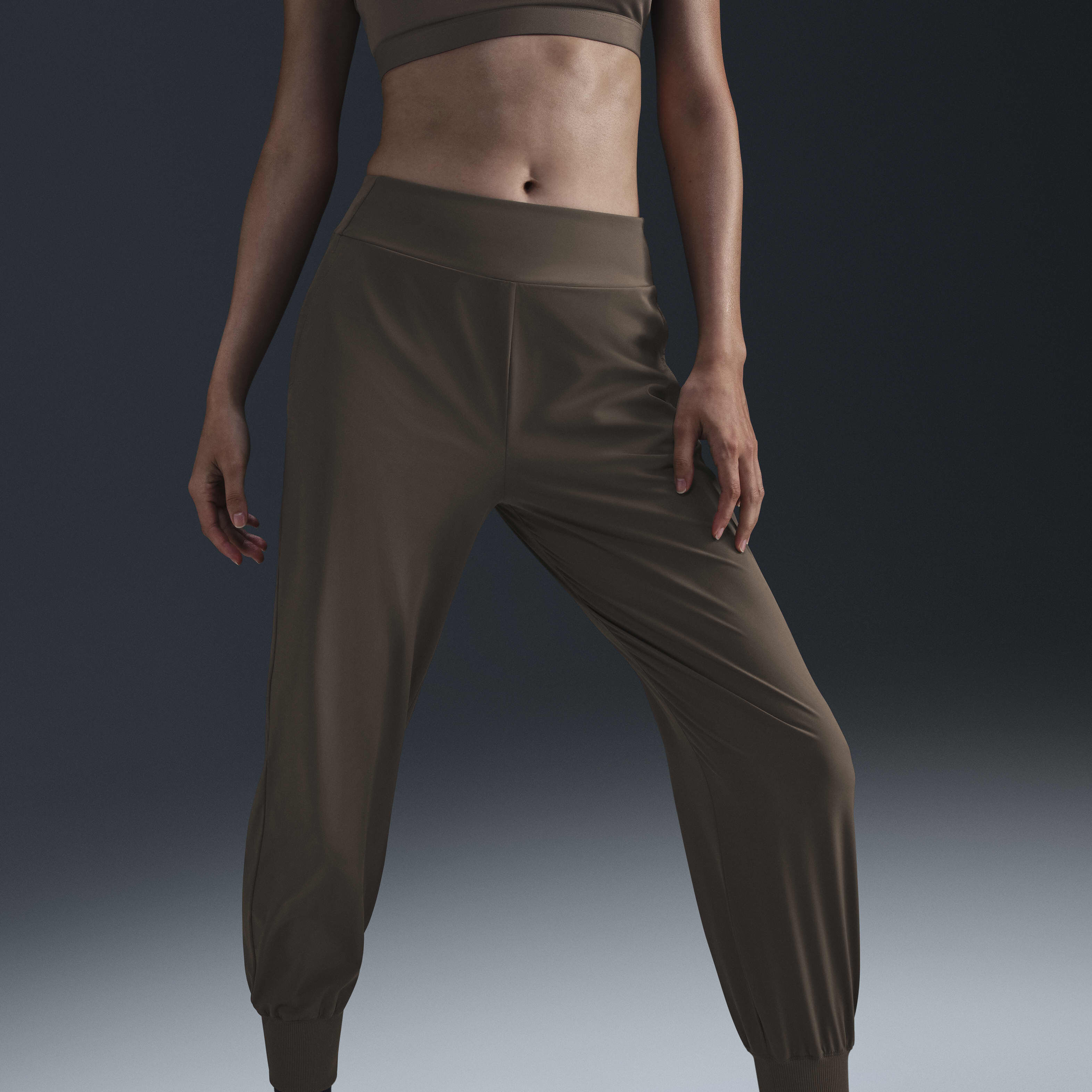 Buy Nike Dri-FIT Bliss Women's Mid-Rise 7/8 Joggers - Ironstone/Clear | Nike  Kuwait Official