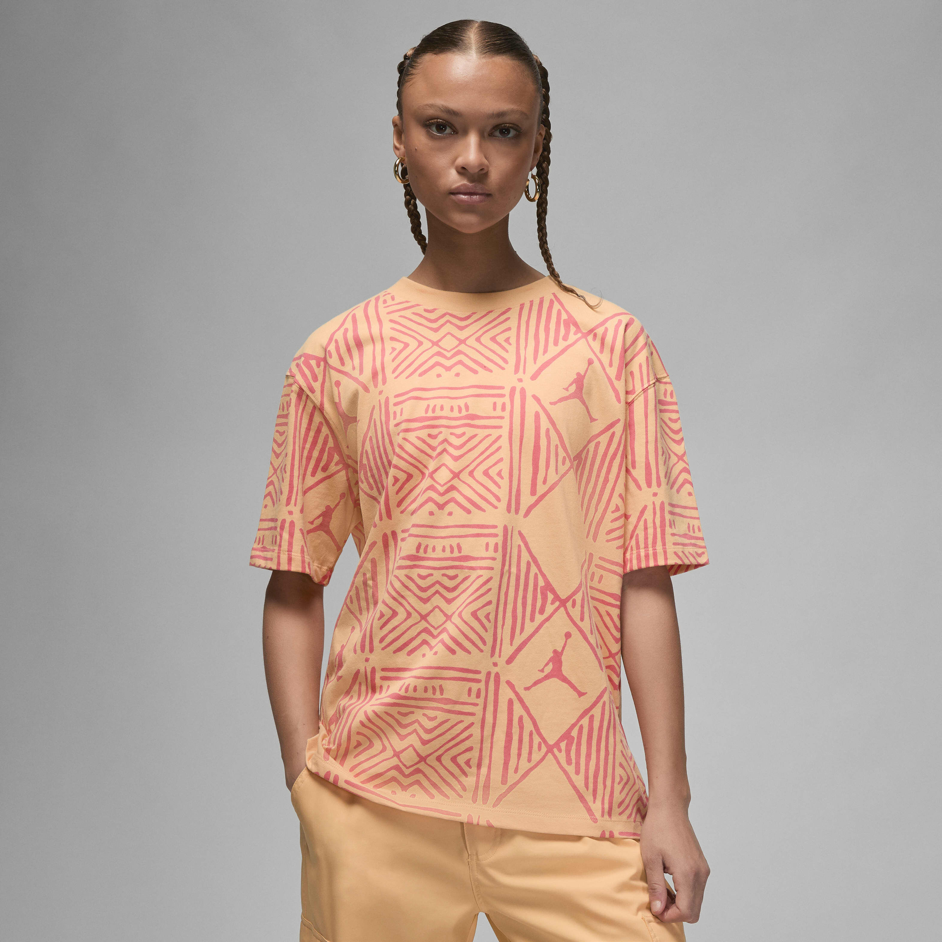 gold nike shirt women's