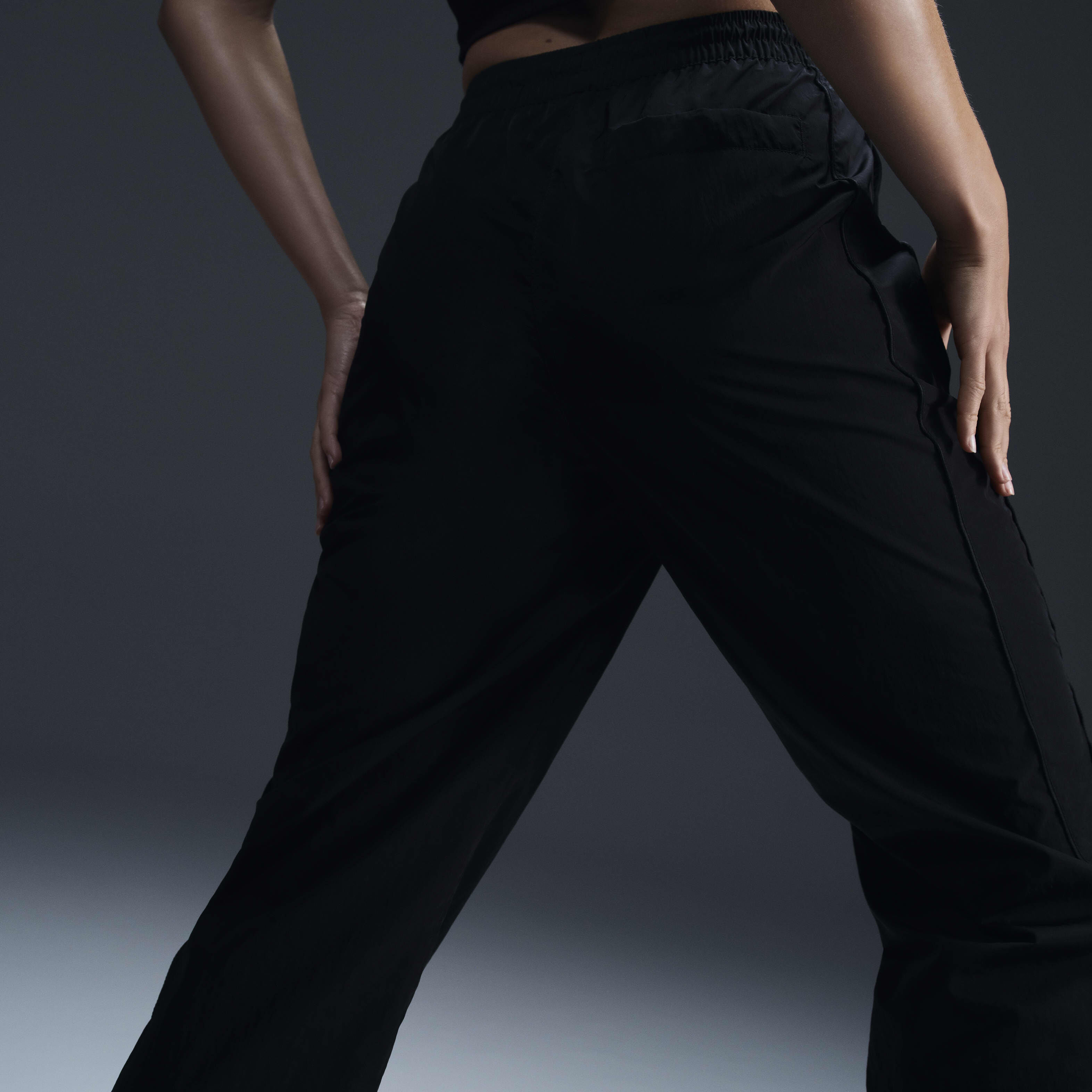 Buy Nike Windrunner Women s High Waisted Woven Open Hem Trousers Black White Nike Kuwait Official