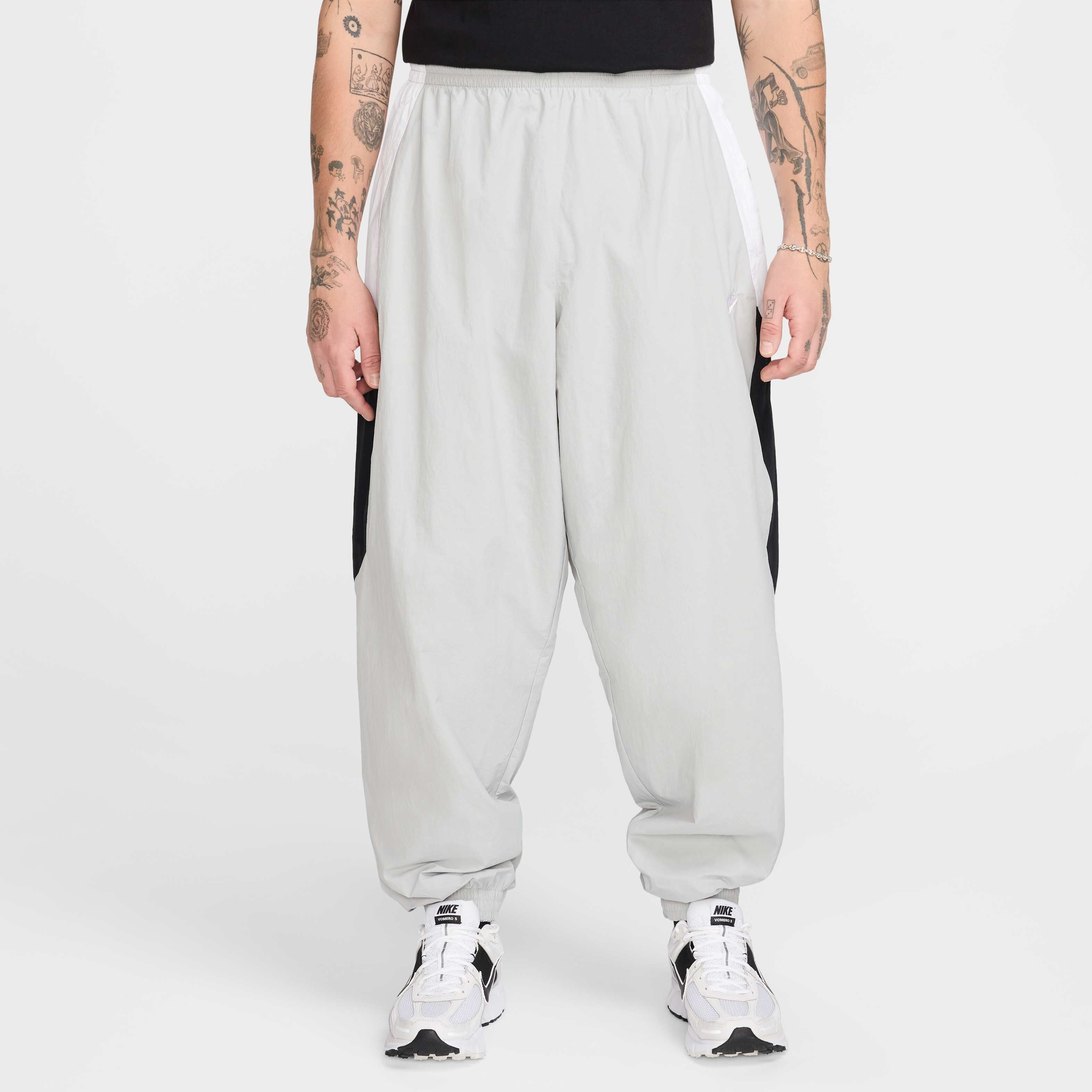Buy Nike Club Men's Oversized Woven Tracksuit Bottoms