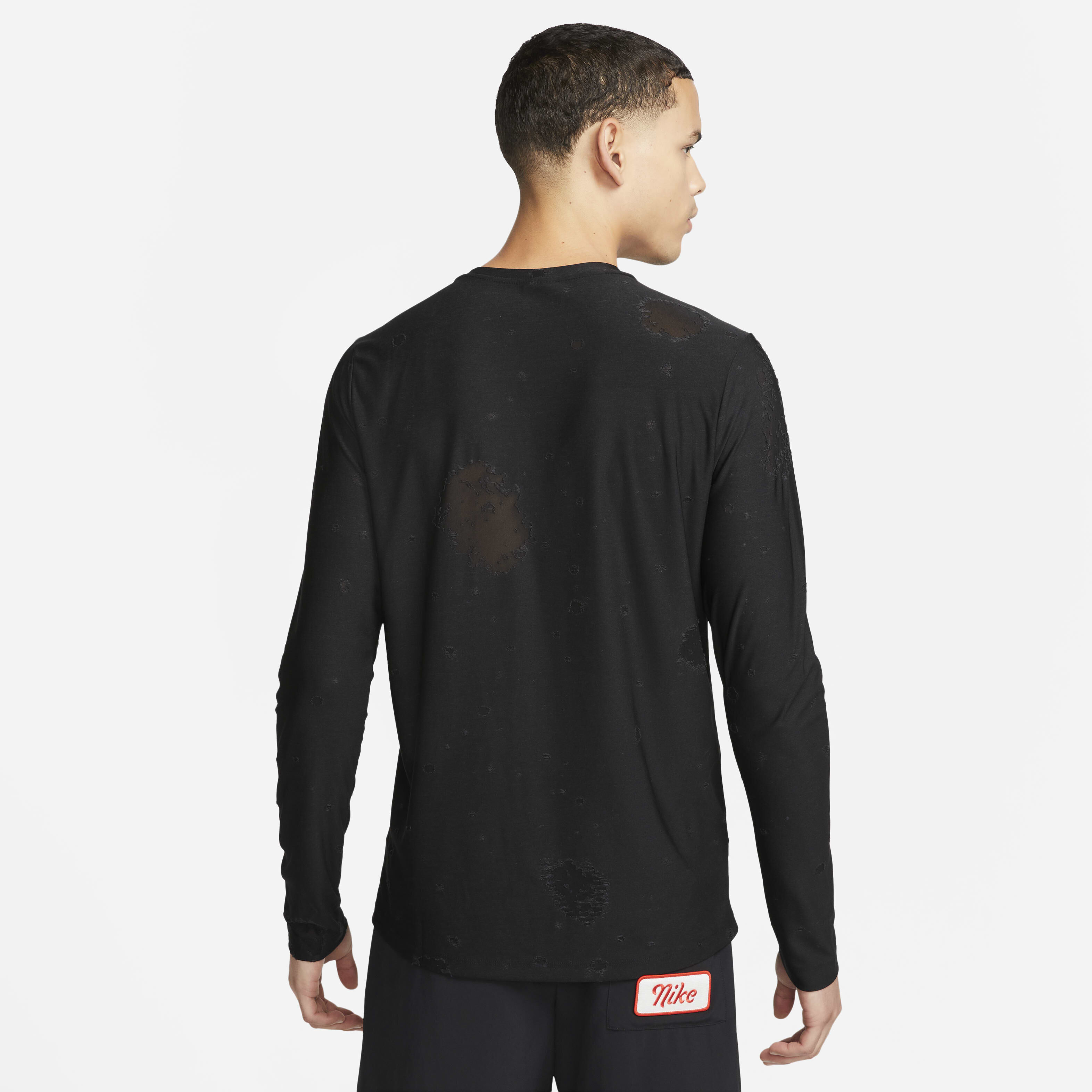 Buy Nike Dri FIT Men s Long sleeve All over Print Fitness Top Nike Kuwait Official