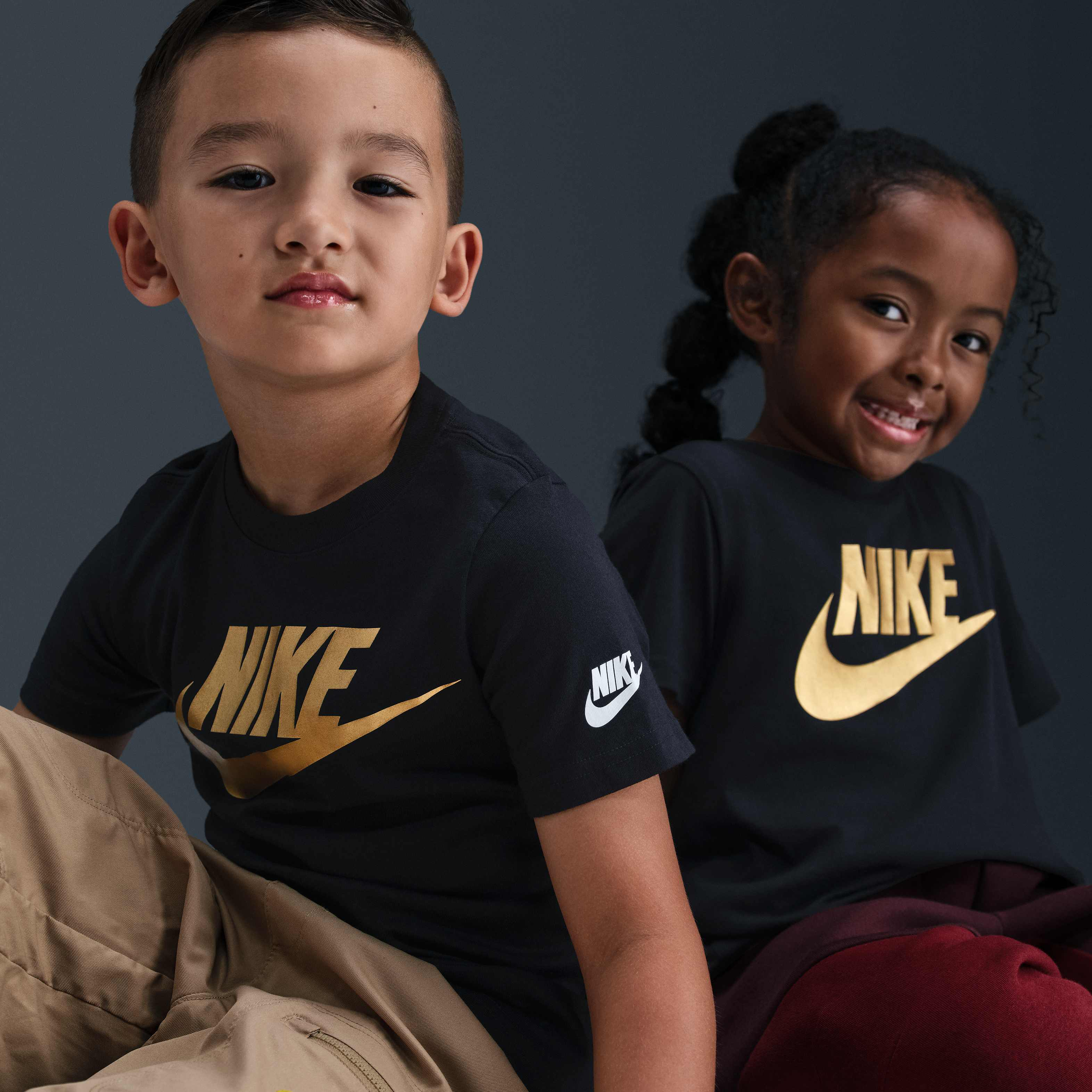 Buy Nike Younger Kids' T-Shirt Black/Metallic Gold Nike Kuwait