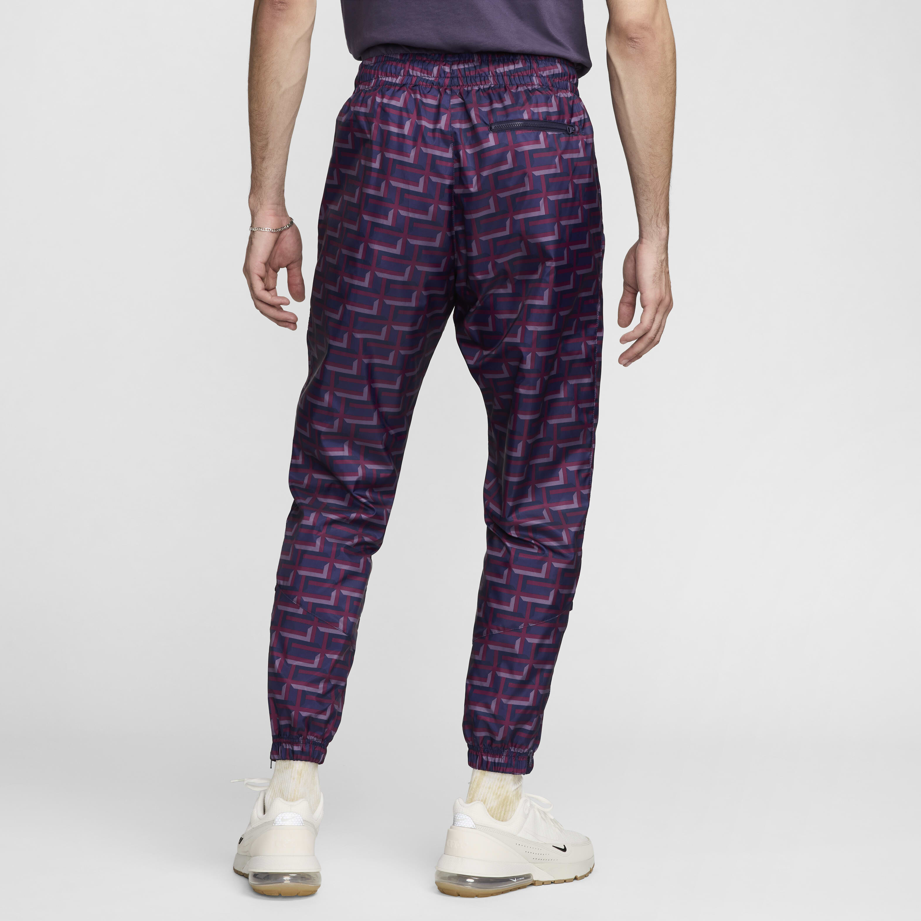 Buy England Windrunner Men s Nike Football Woven Pants Rosewood Purple Ink Sesame Nike Kuwait Official