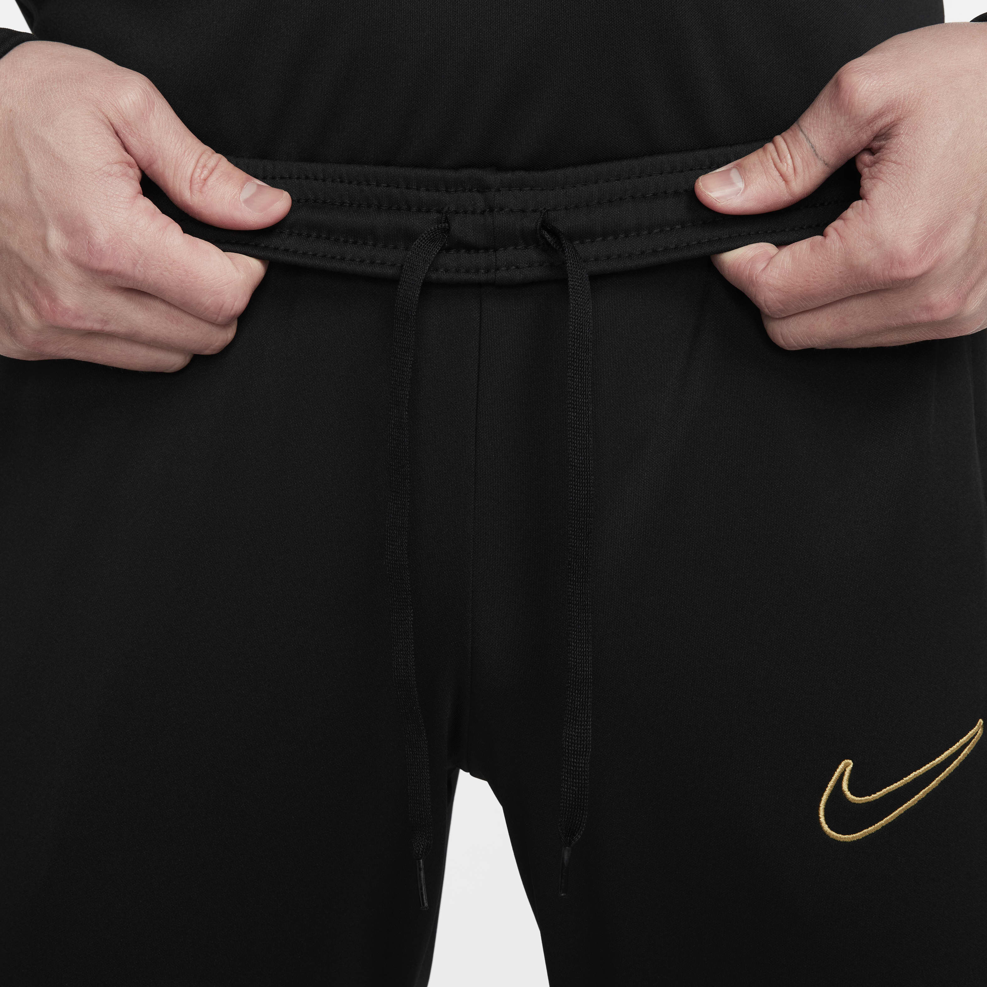nike black gold pants
