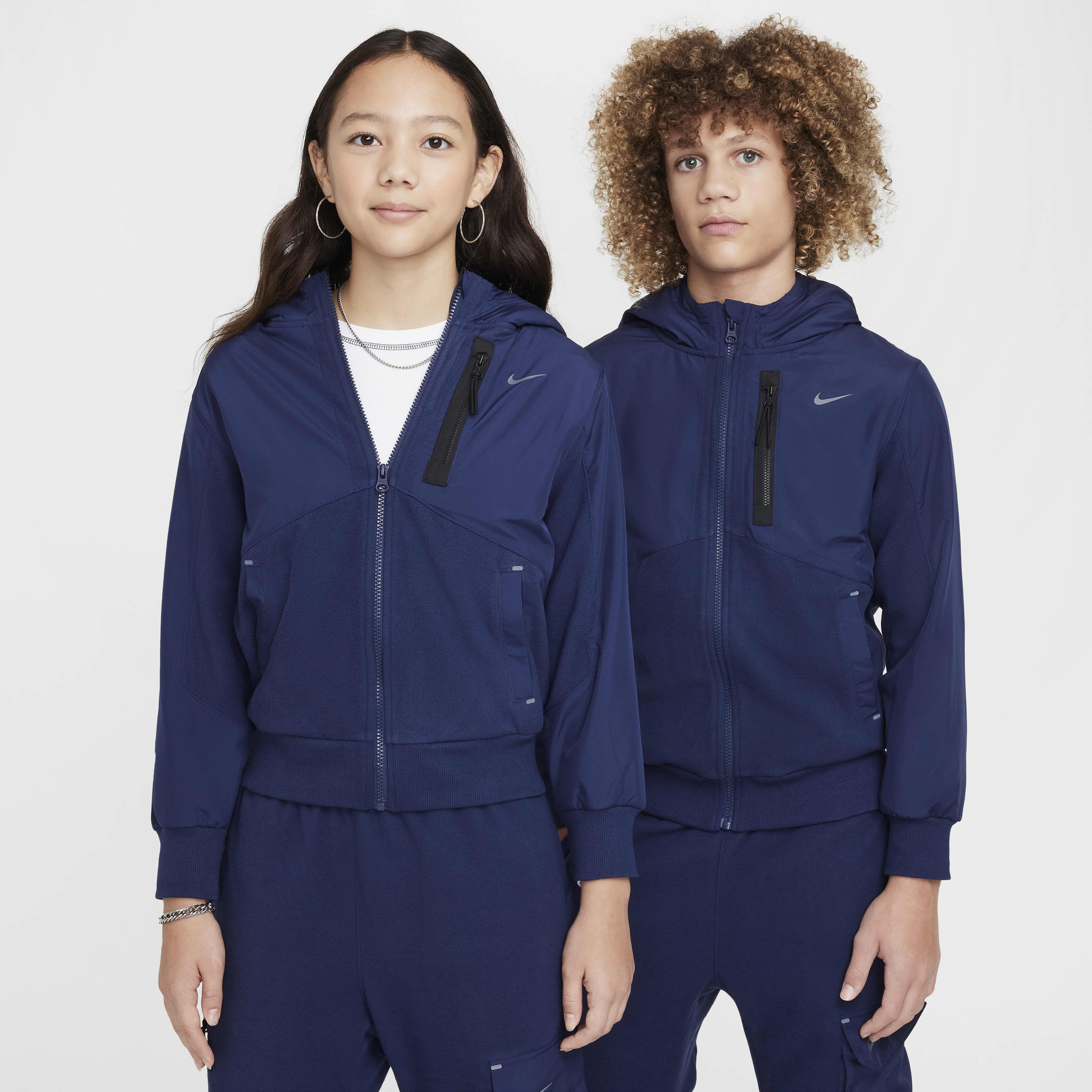 Nike utility tracksuit deals