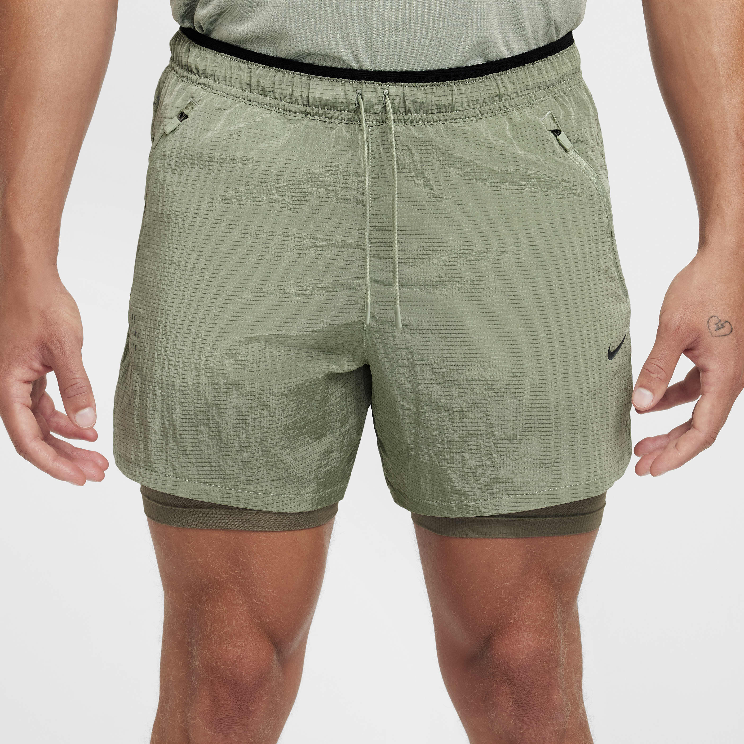Buy Nike Stride Running Division Men s 13cm approx. Dri FIT Water Repellent 2 in 1 Running Shorts Jade Horizon Nike Kuwait Official