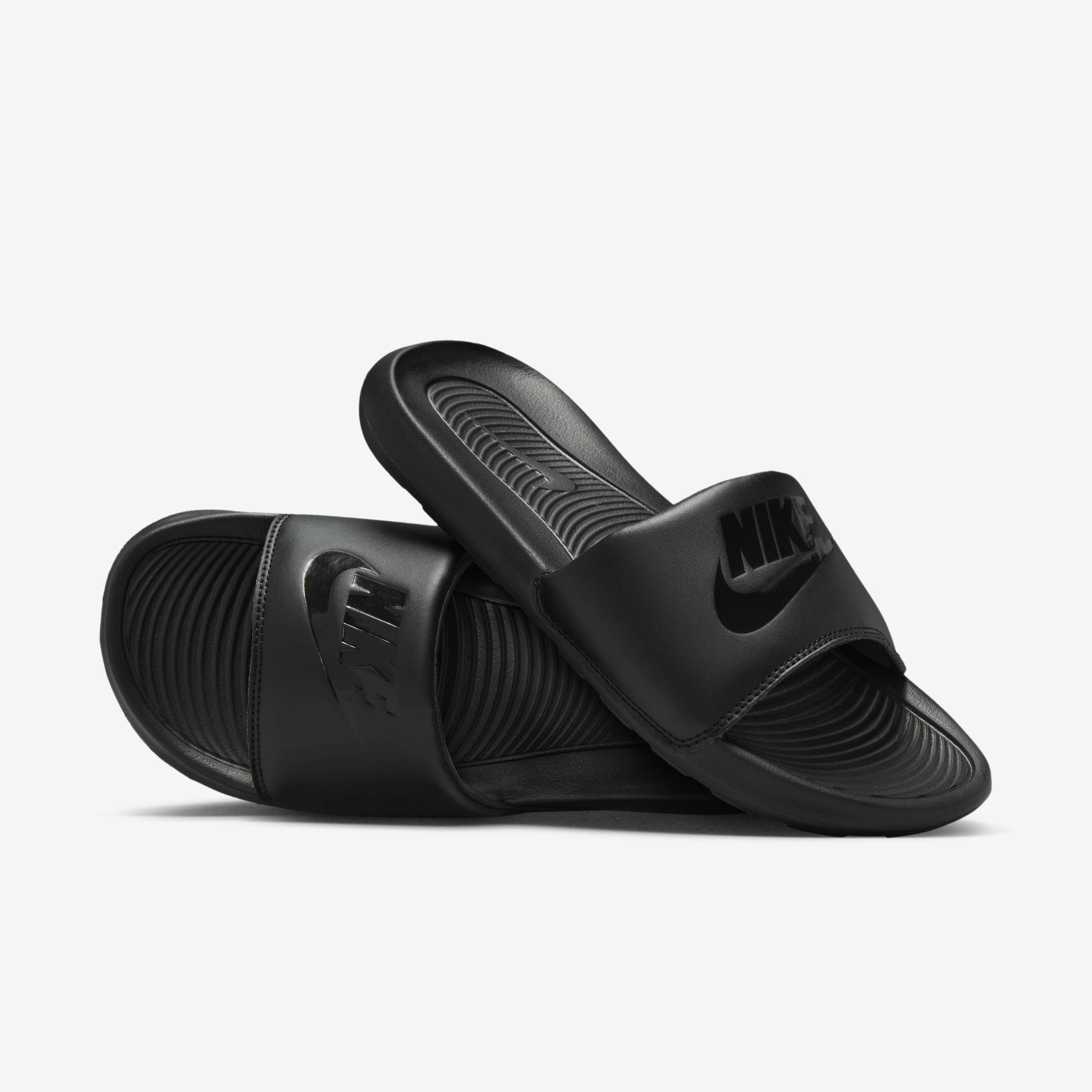 Grey nike flip flops top