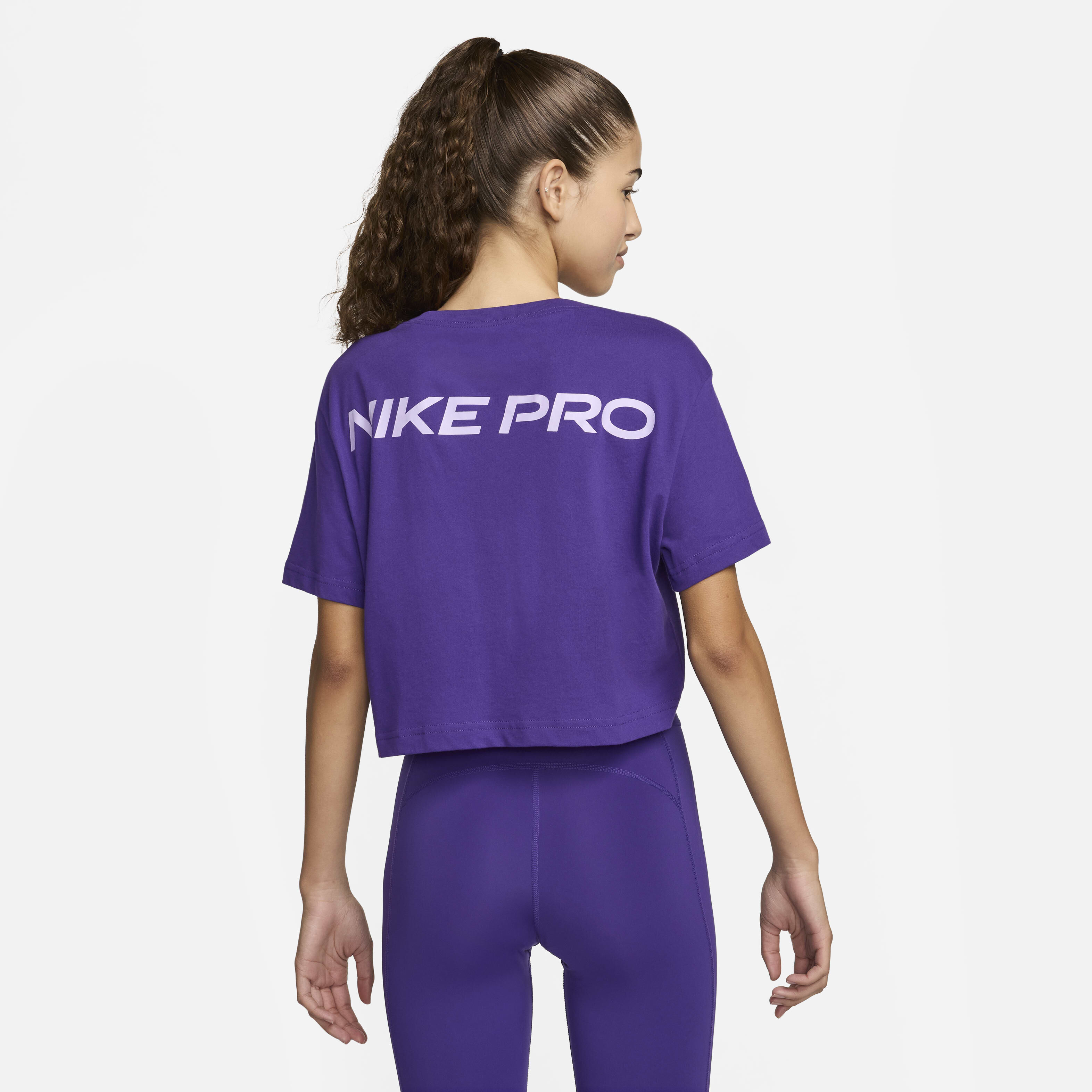 Buy Nike Pro Women s Dri FIT Short Sleeve Cropped Tee Court Purple Nike Kuwait Official