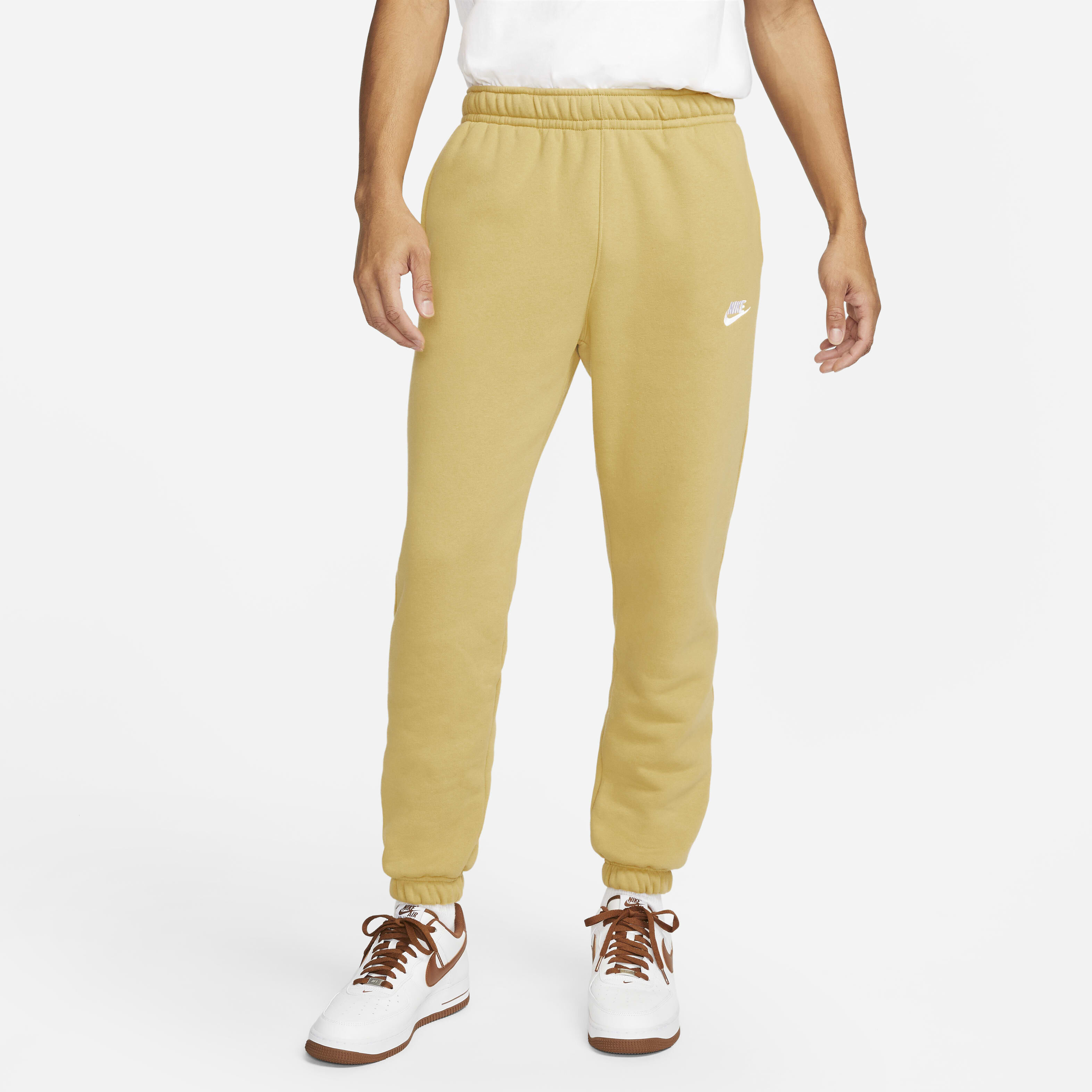 Nike nsw yellow pants hot sale