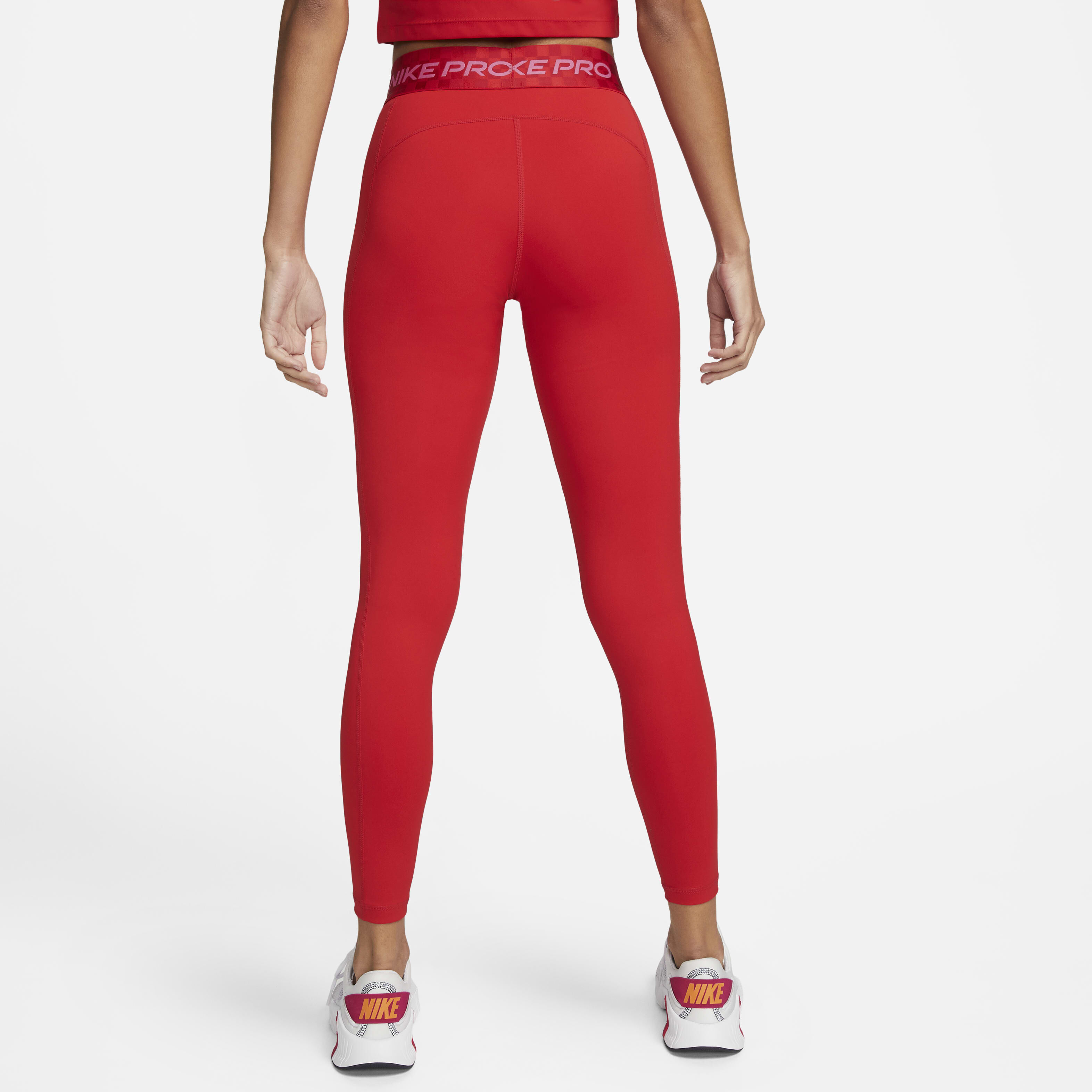 Buy Nike Pro Women s Mid Rise Full Length Graphic Training Leggings University Red Gym Red Pinksicle Nike Kuwait Official