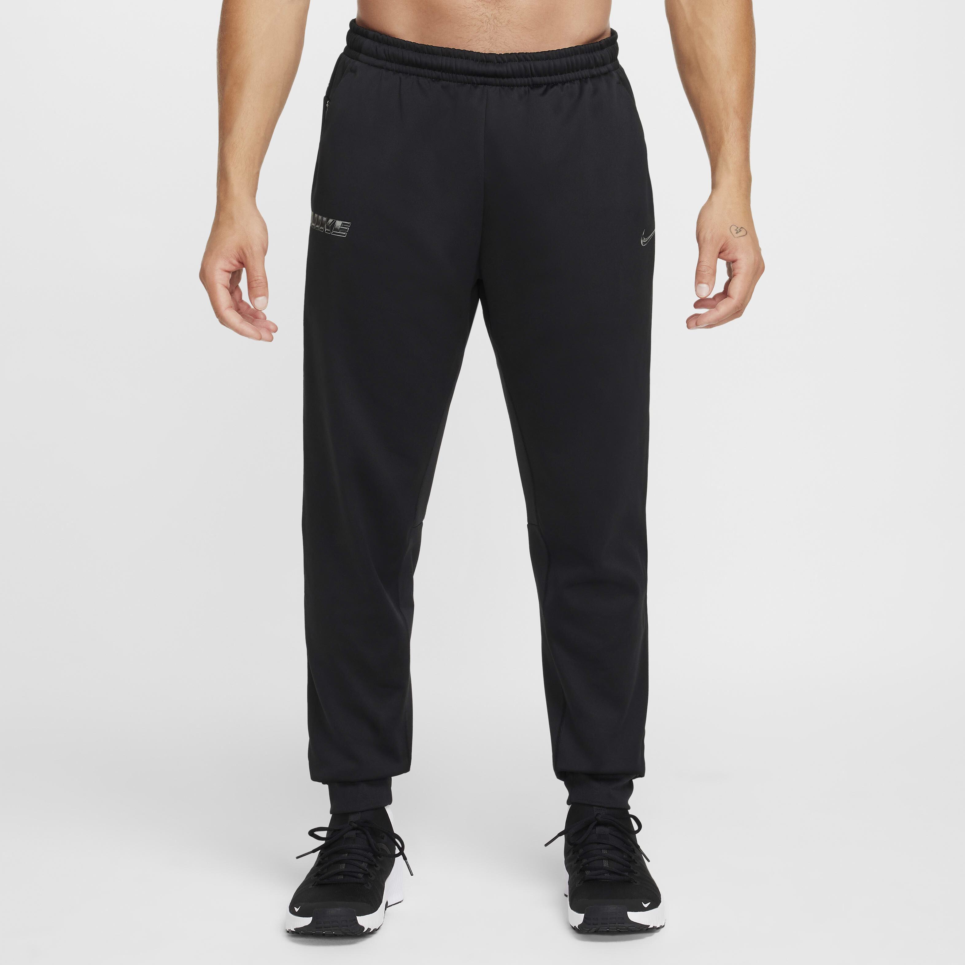 Buy Nike Men's Therma-FIT Tapered Fitness Trousers - Black
