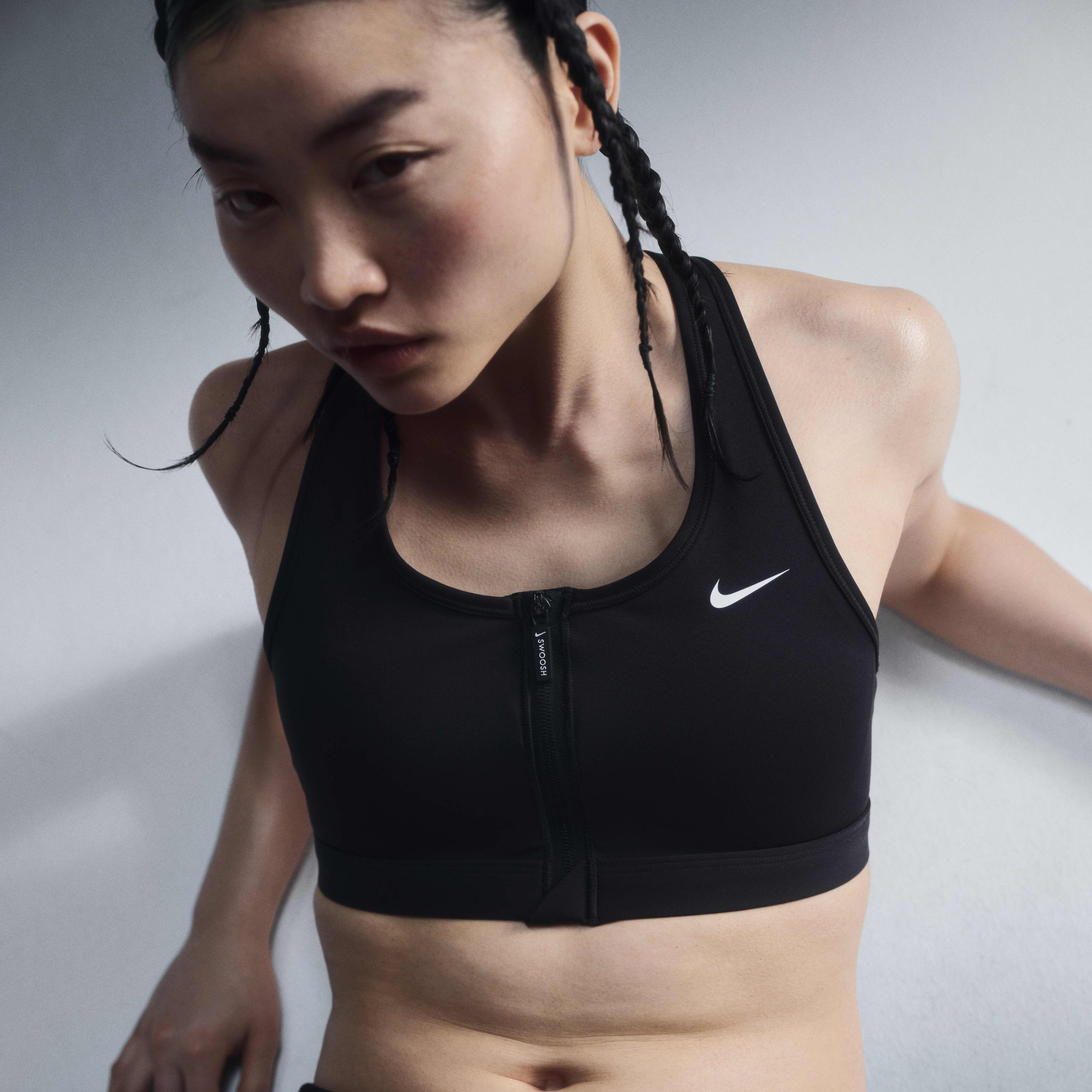 Buy Nike Swoosh Front Zip Women s Medium Support Padded Sports Bra Nike Kuwait Official