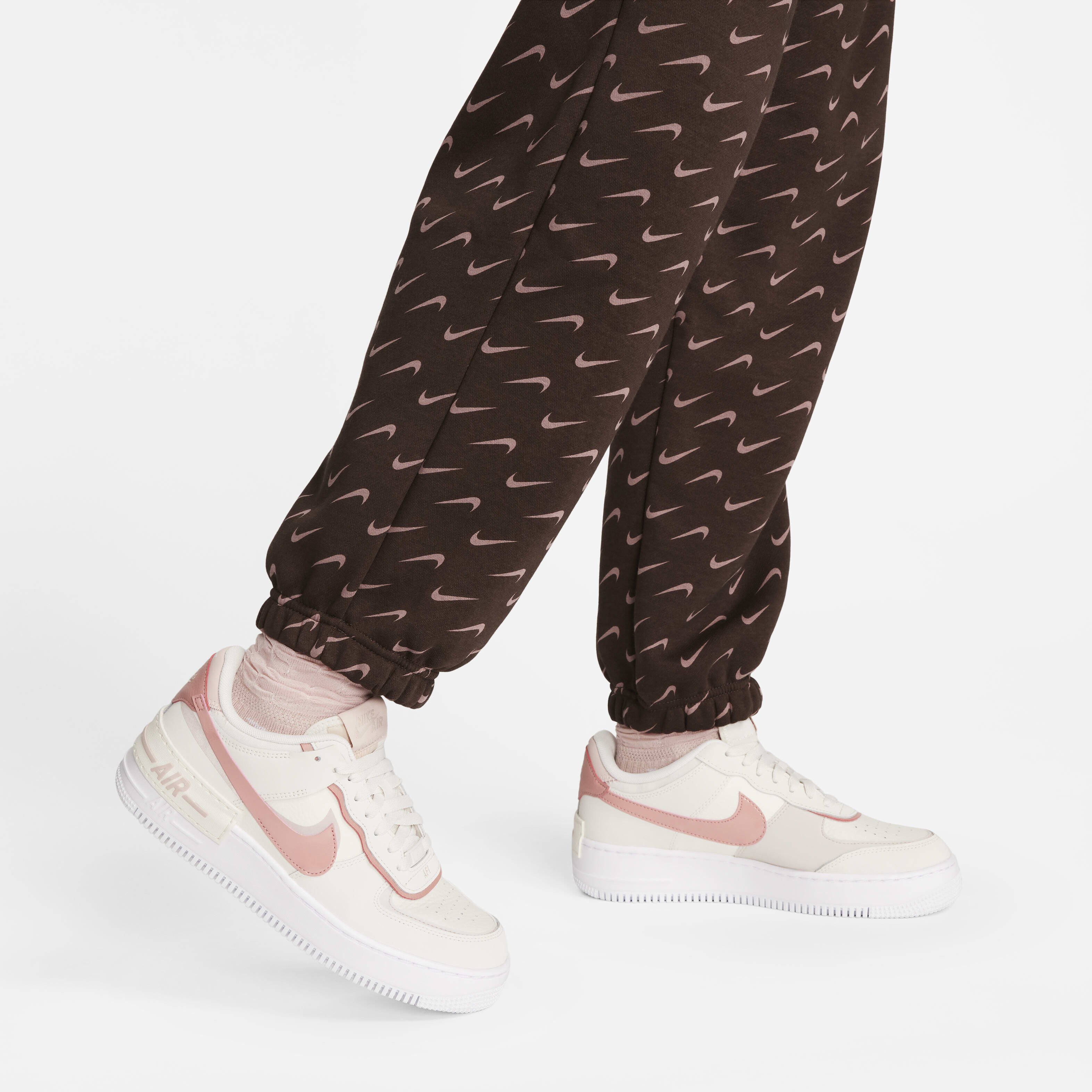 Buy Nike Sportswear Phoenix Fleece Women s Oversized Printed Tracksuit Bottoms Baroque Brown Nike Kuwait Official